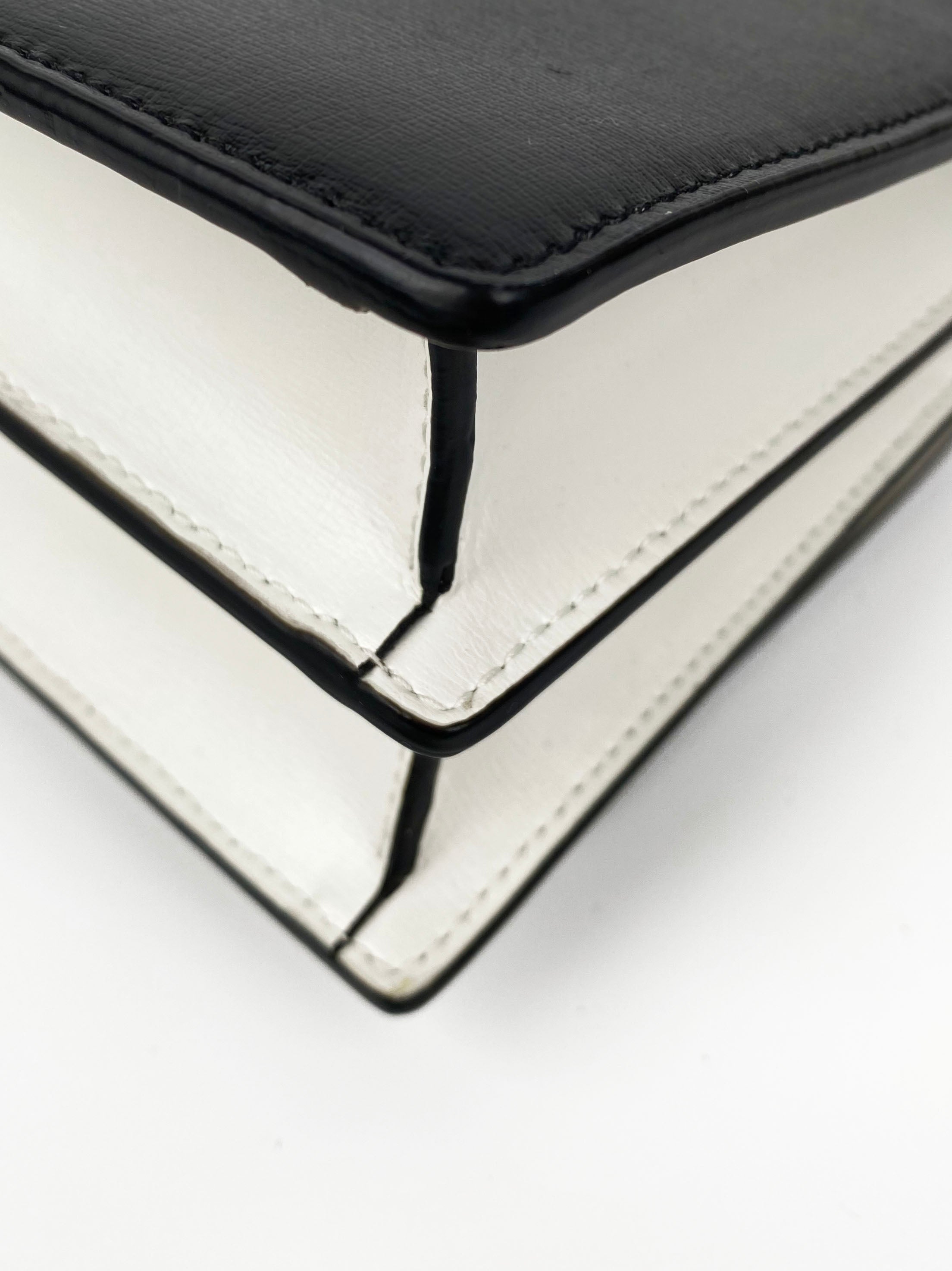 Saint Laurent Sunset Bag - Black & White Two-Tone Designer Handbag for Women | Perfect for Evening Parties, Date Nights & Luxury Fashion Accessories