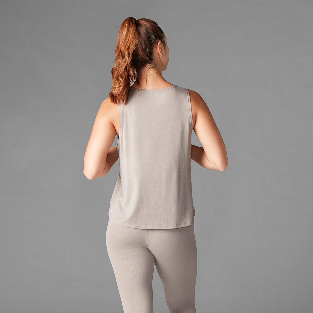 Tavi Noir High Low Tank Top for Women - Stylish Asymmetrical Hem Casual & Party Wear - Perfect for Layering, Workouts, and Night Out
