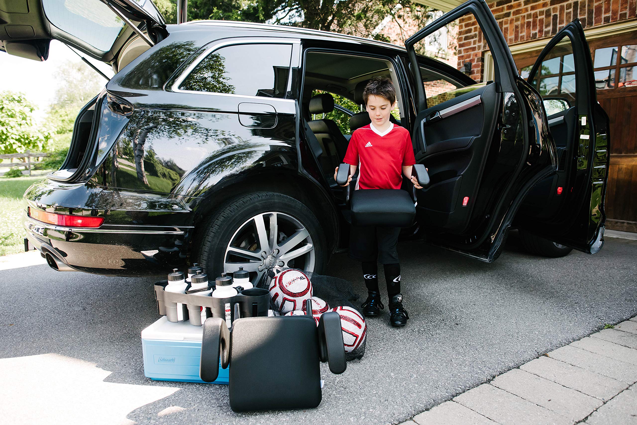 **Clek Ozzi Backless Booster Car Seat – Lightweight 5 lbs, Padded Comfort Cube, Removable Cover & LATCH Connectors – Safe & Portable for Kids Travel (Carbon Black) – Perfect for Road Trips & School Carpool**