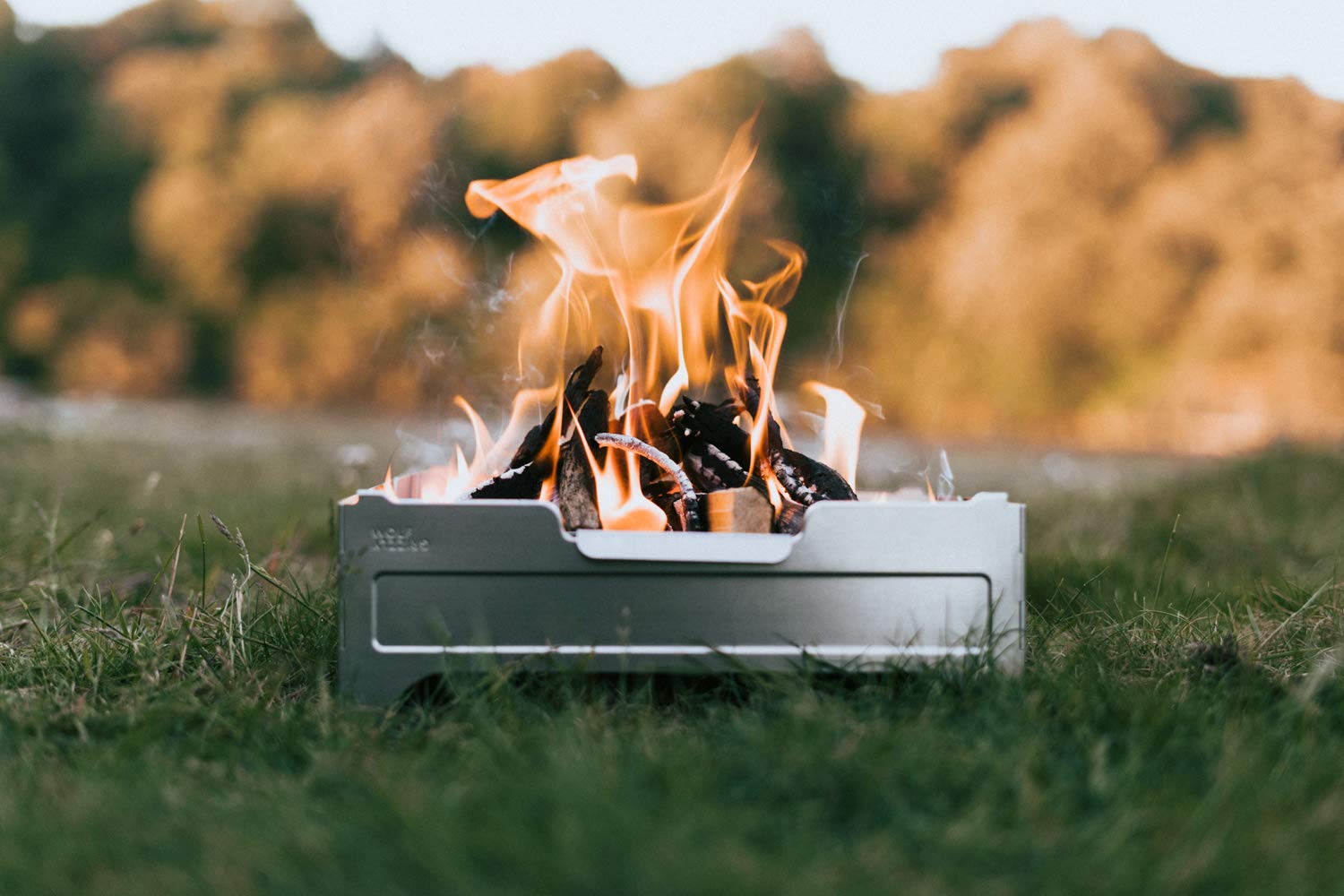 Wolf and Grizzly Fire Safe - Portable & Foldable Camping Fire Pit for Outdoor Cooking, Campfires & Backyard Use | Compact Folding Firepit | Works with Portable Camping Grill | Perfect for RV Trips, Beach Bonfires & Backyard Gatherings