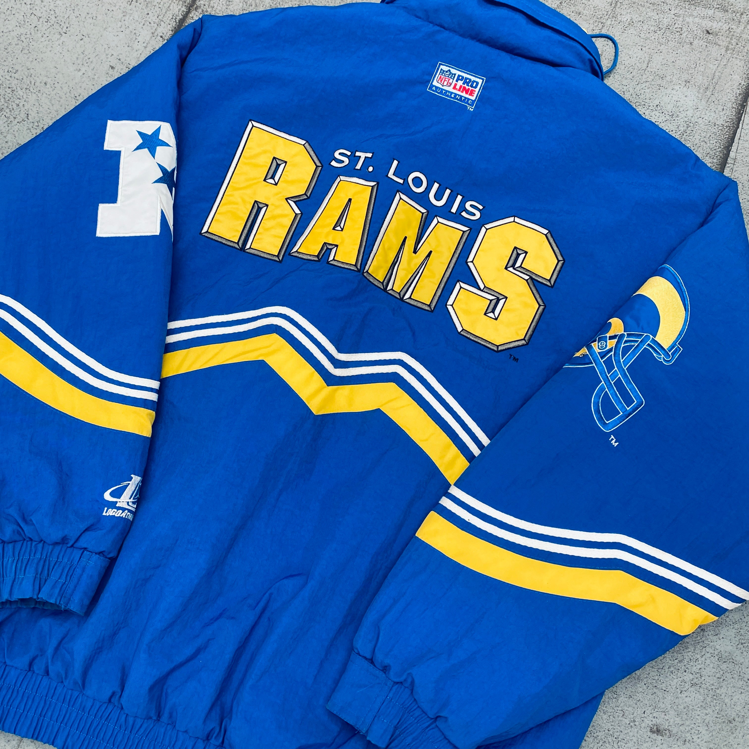 Vintage St. Louis Rams 1990s Logo Athletic Full-Zip Diamond Spike Jacket - Proline NFL Football Team Apparel (Medium/Large) - Perfect for Game Day, Tailgating & Sports Fan Collectibles