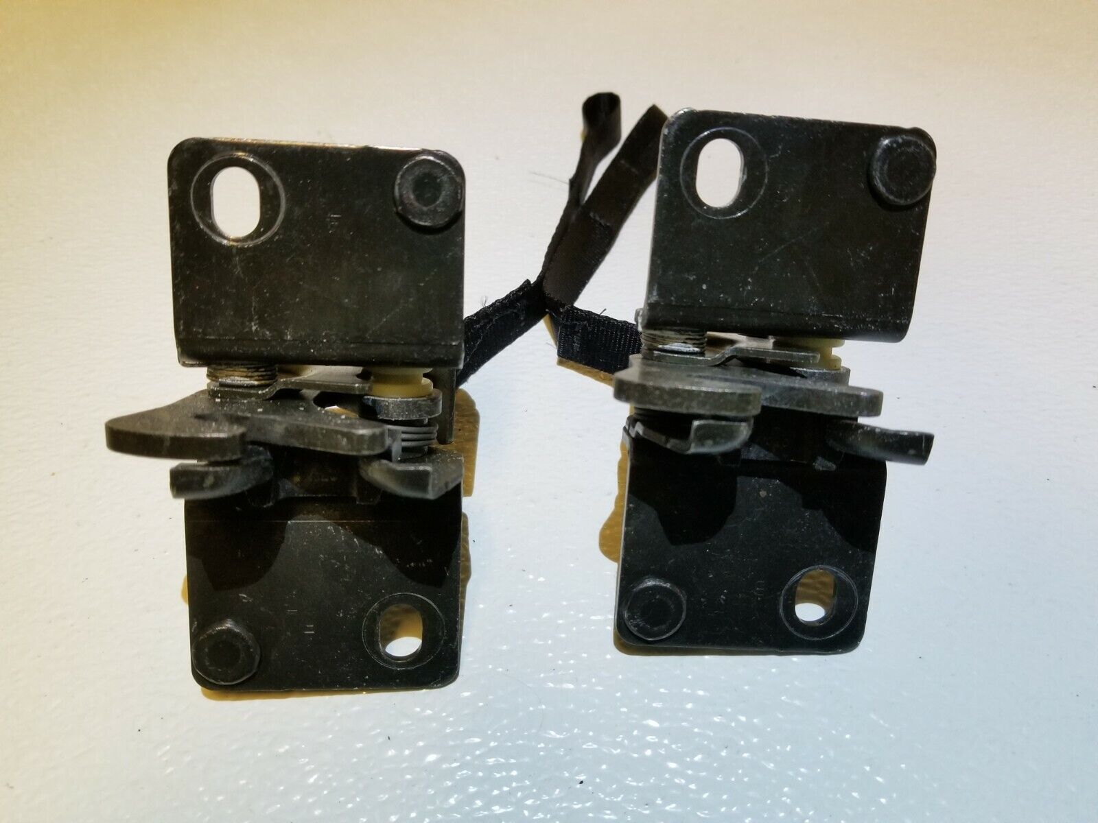 04-08 Nissan Maxima Rear Seat Fold Lock Pair - OEM Replacement Parts for Secure Cargo & Passenger Safety - Perfect for Road Trips & Family Travel