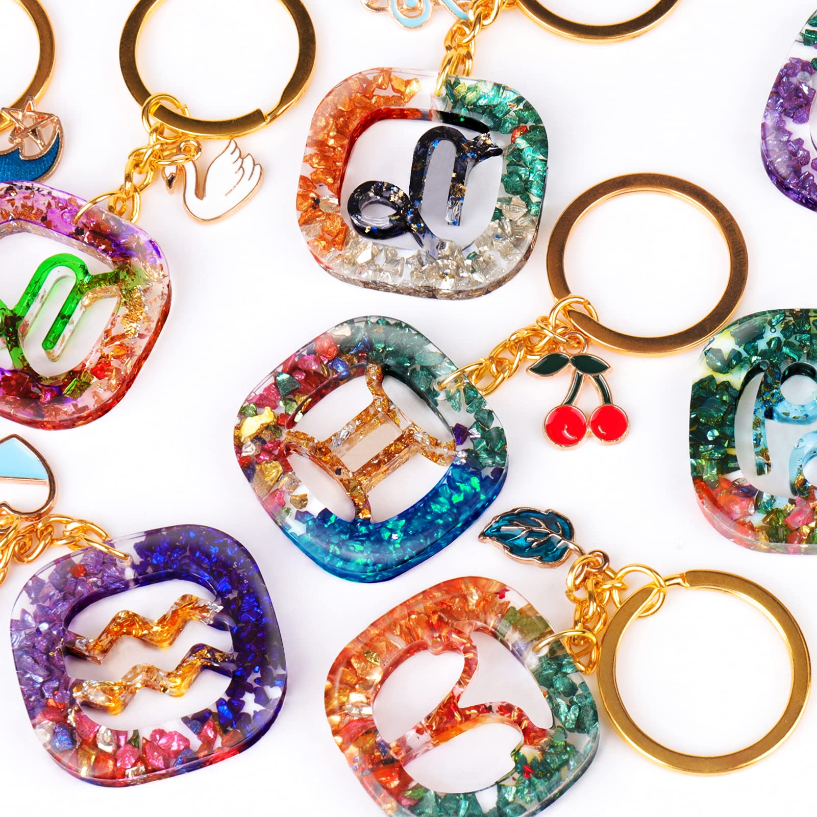 12 Constellation Epoxy Jewelry Casting Molds - Zodiac Keychain Silicone Resin Molds with 50 Open Jump Rings for DIY Pendant Ornaments, Christmas Decorations & Gifts - Perfect for Handmade Jewelry Making, Craft Projects and Personalized Presents