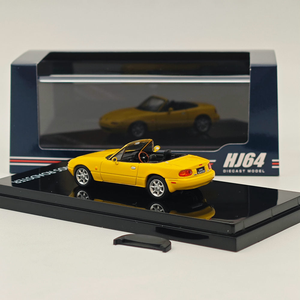1/64 Scale Mazda Eunos Roadster NA6CE Diecast Model Car with Tonneau Cover - Limited Edition Yellow HJ642025BY - Collectible Hobby Japan Toy for Car Enthusiasts & Gift Ideas - Perfect for Display, Racing Scenes & Diecast Collections