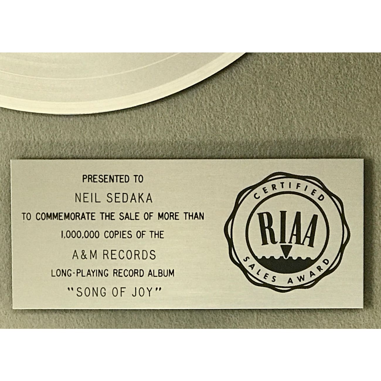 Captain & Tennille Song Of Joy RIAA Platinum LP Award Presented to Neil Sedaka - Rare Collectible Vinyl Record for Music Enthusiasts & Memorabilia Collectors - Perfect for Display in Home, Office, or Music Studio