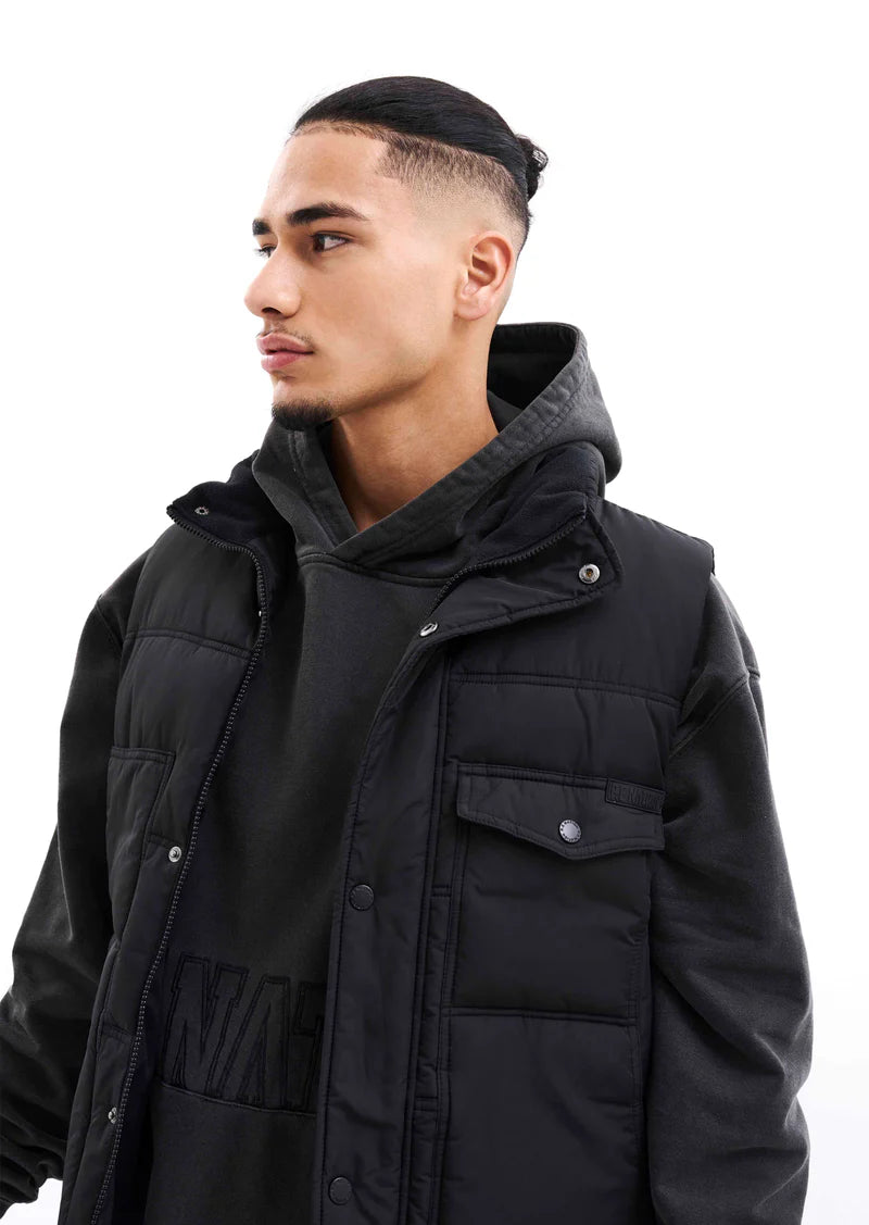 Black Cutback Vest for Men & Women - Stylish Layering Piece for Outdoor Adventures & Casual Wear