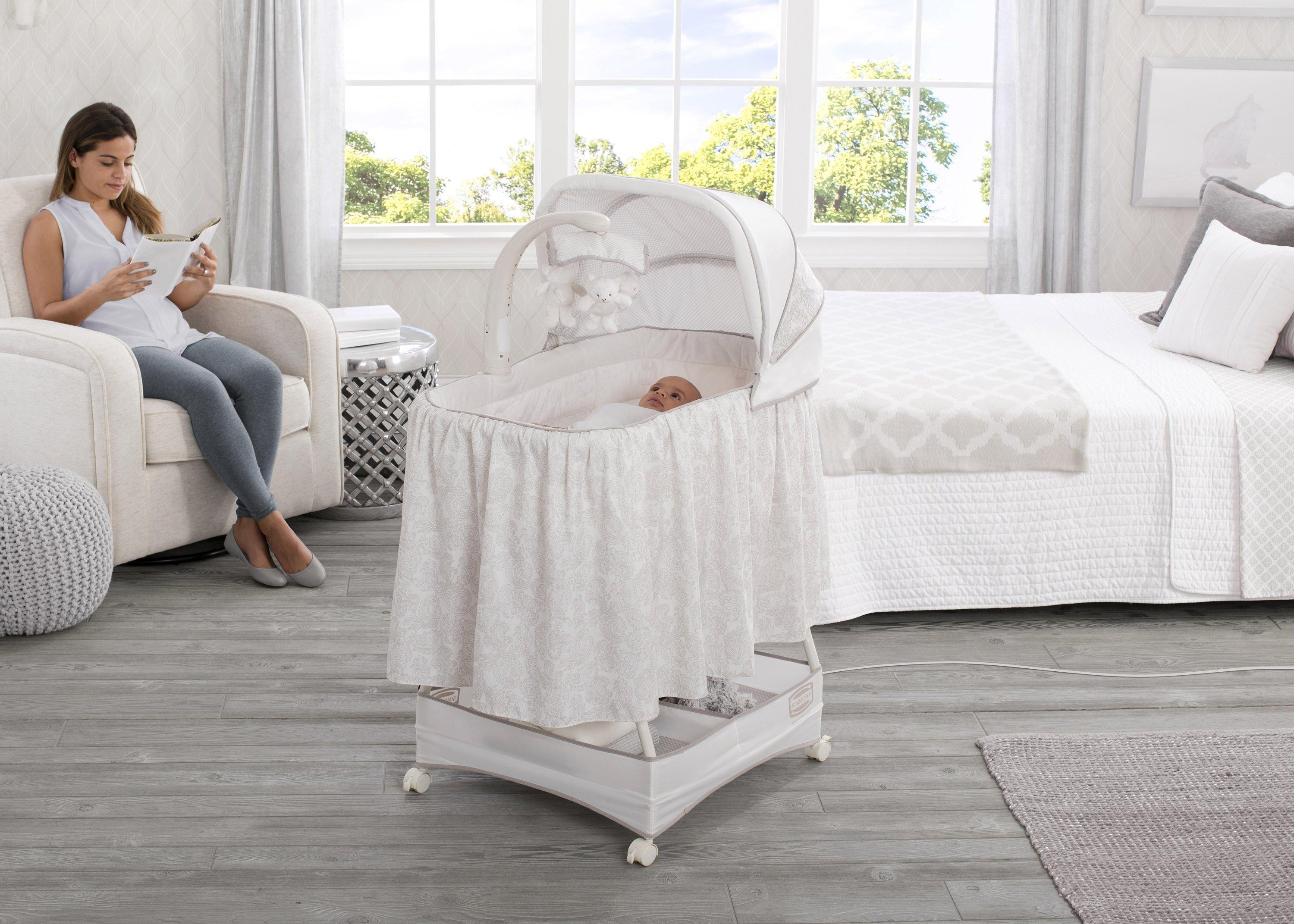 Simmons Kids Silent Auto Gliding Deluxe Bassinet - Ultra Quiet Baby Crib with Smooth Motion for Newborns & Infants | Perfect for Nursery, Bedroom & Travel Use