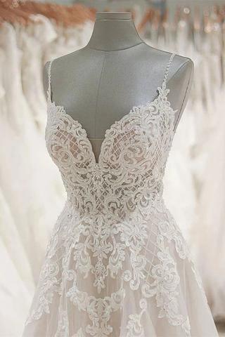 Elegant A-Line Spaghetti Strap Tulle Wedding Dress with Applique Details - Perfect for Bridal, Prom, and Formal Occasions | TN189
