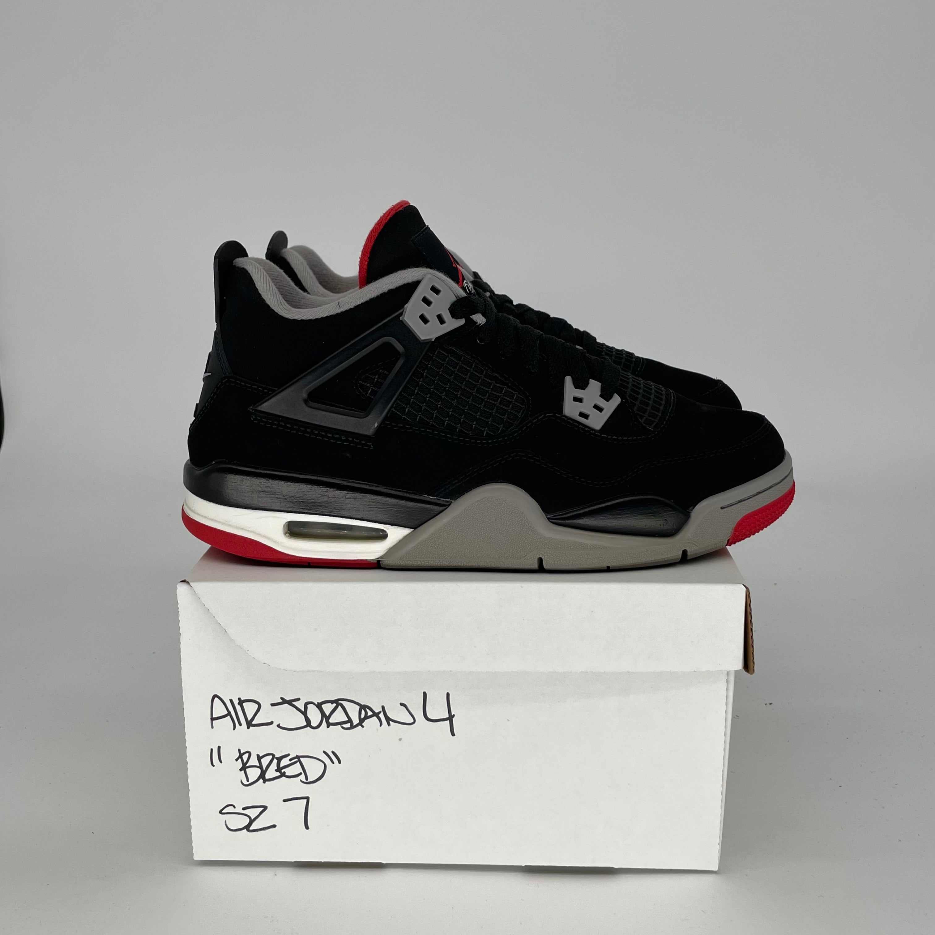 Original Title: AIR JORDAN 4 BRED SIZE 7/8.5W 408452 060   Optimized Title: **Air Jordan 4 Retro 'Bred' Black/Red Men's & Women's Basketball Shoes Size 7 & 8.5W (Style: 408452-060) – Perfect for Streetwear & Sneaker Collectors**