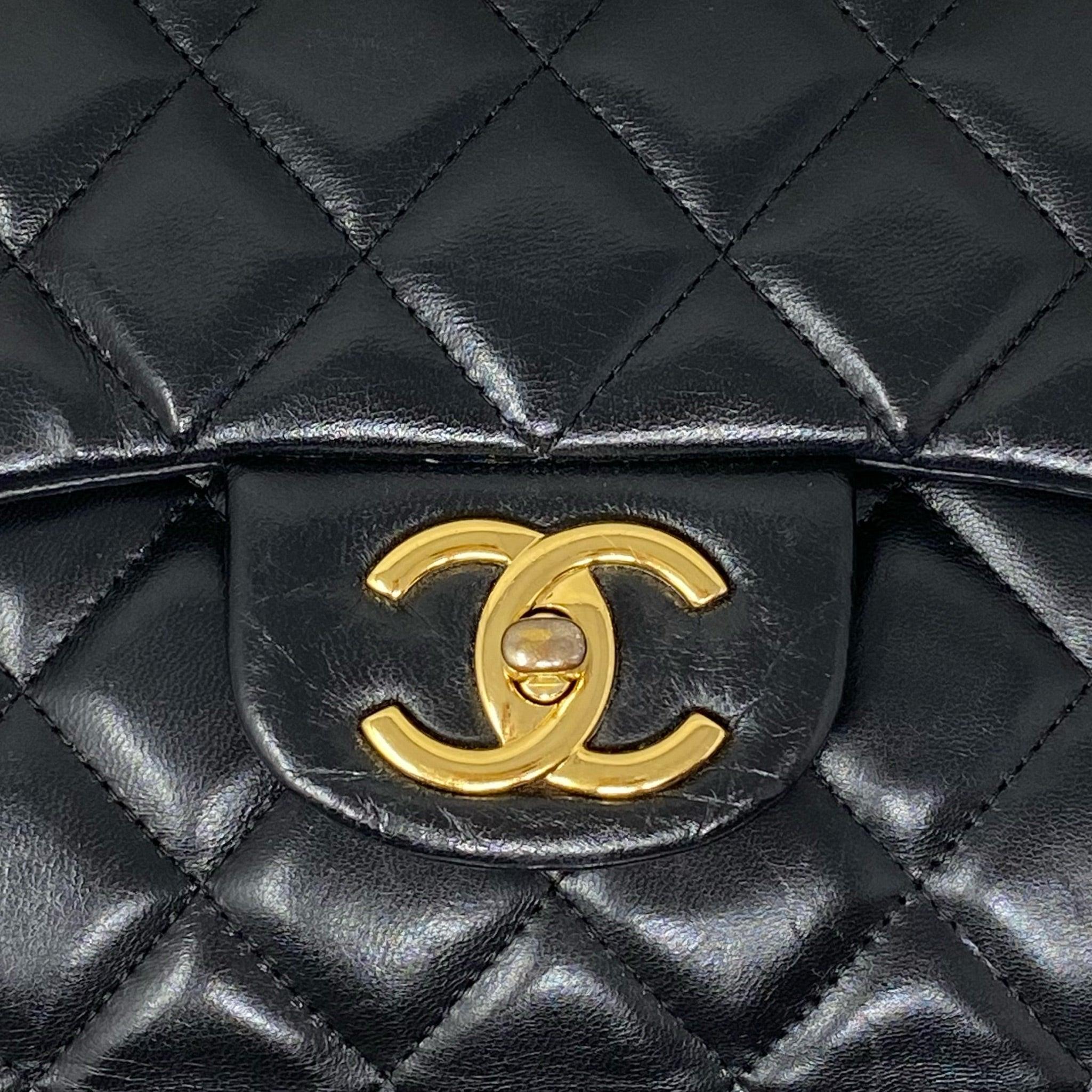 Chanel Black Lambskin Maxi Classic Flap Bag - Luxury Designer Handbag for Women | Perfect for Evening Events, Parties & Special Occasions