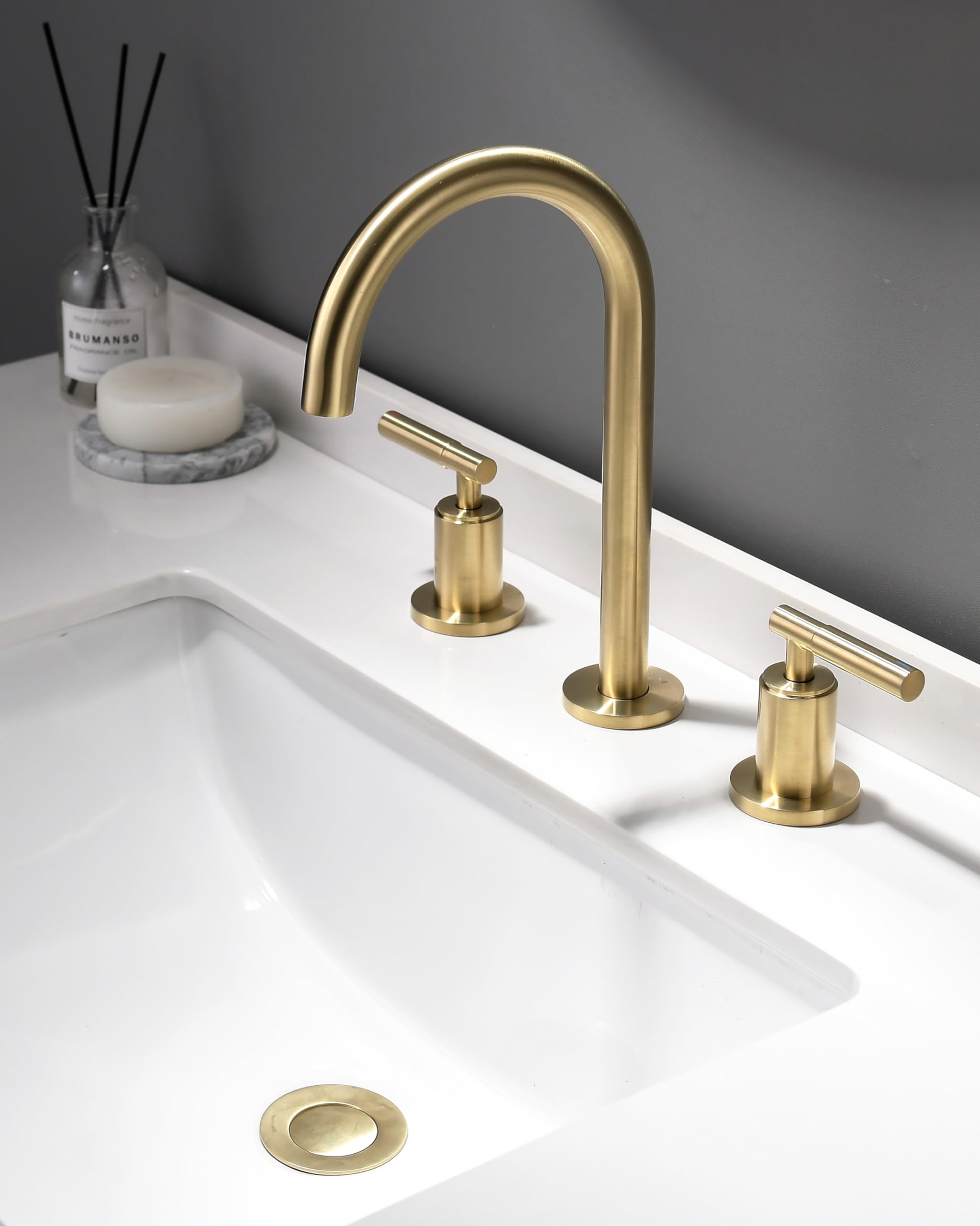 Brushed Gold Bathroom Faucet - Indare 2-Handle Widespread Sink Faucet with 360° Swivel Spout, 4-8 Inch Centerset, Brass Construction, Includes Pop-Up Drain & Water Supply Lines - Perfect for Modern Bathroom Vanities and Powder Rooms