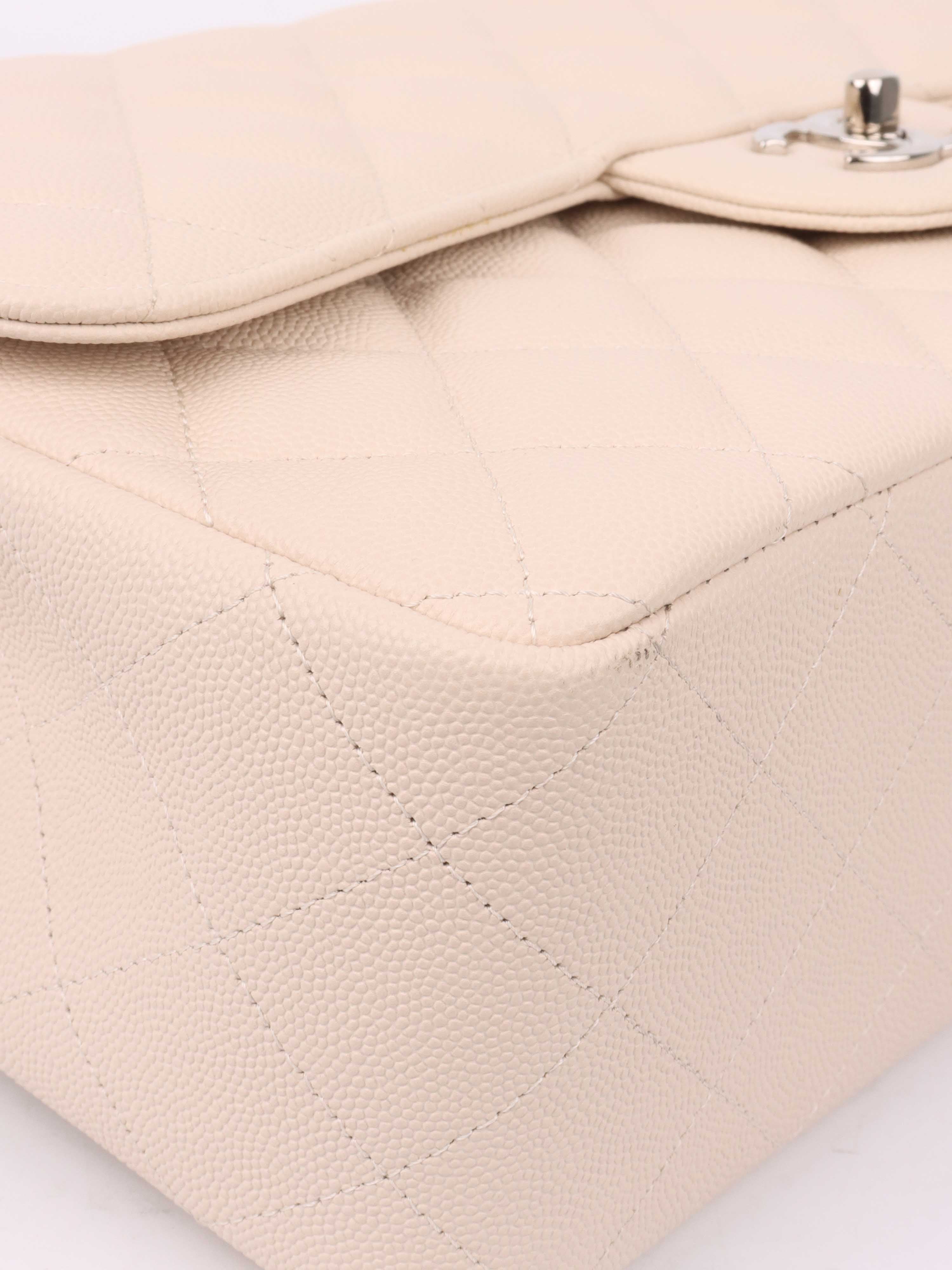 Chanel Jumbo Ivory Caviar Classic Flap Bag - Luxury Designer Handbag for Women | Perfect for Parties, Weddings & Special Occasions