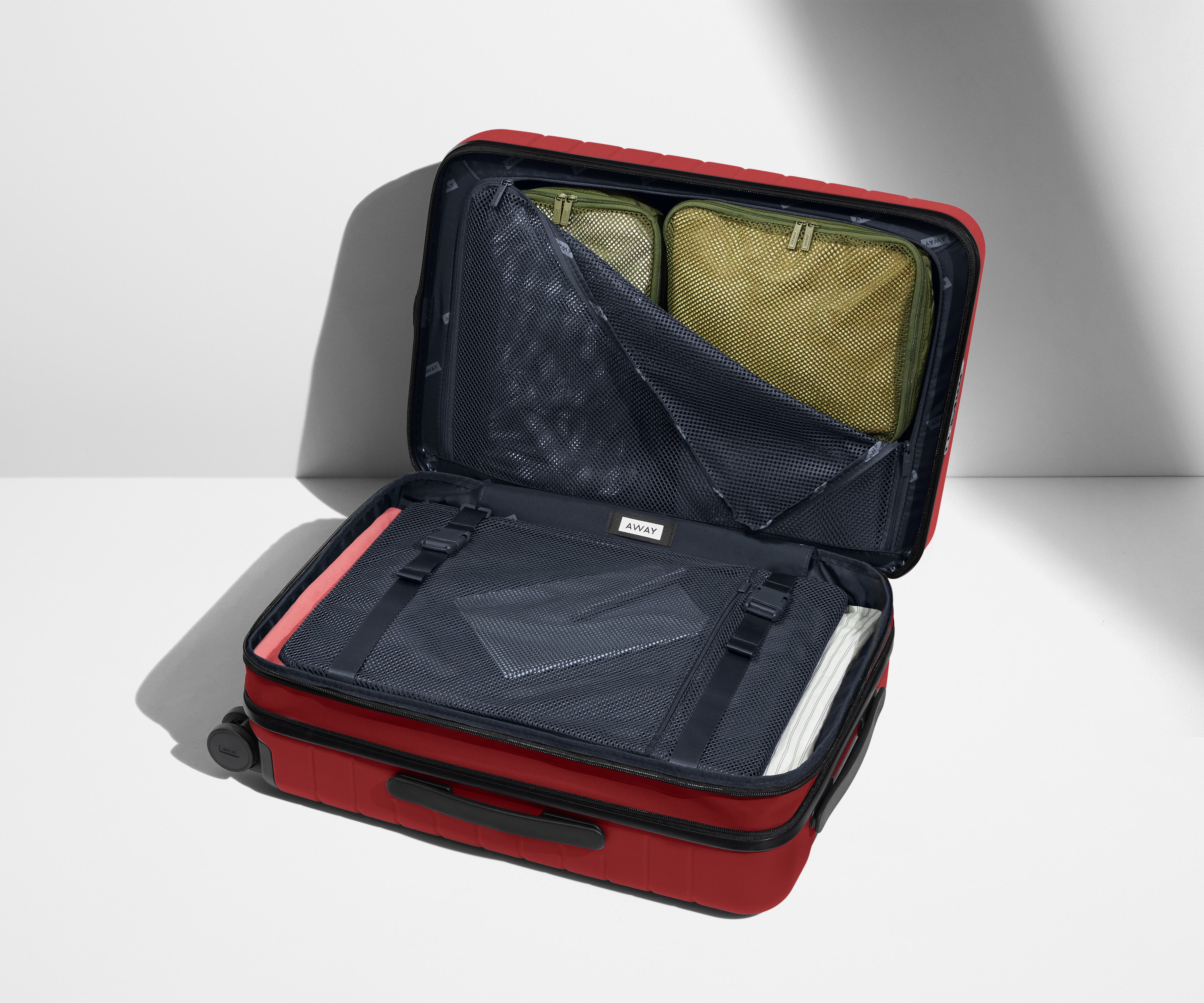 The Carry On Flex in Tango Red - Lightweight Expandable Luggage for Travel - Perfect for Business Trips & Weekend Getaways