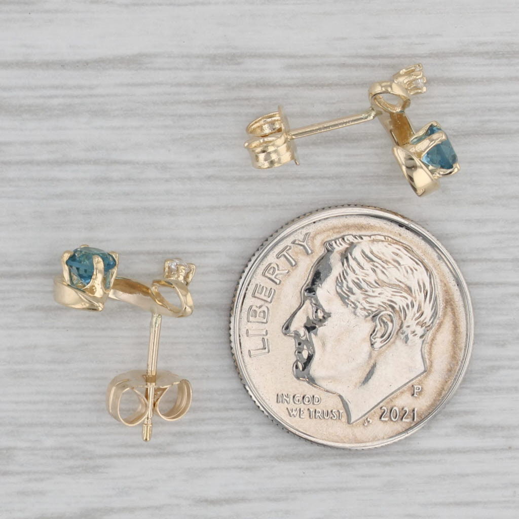 0.48ctw Blue Topaz & Diamond Swirl Stud Earrings in 14k Yellow Gold - Elegant Jewelry for Women, Perfect for Weddings, Parties & Special Occasions