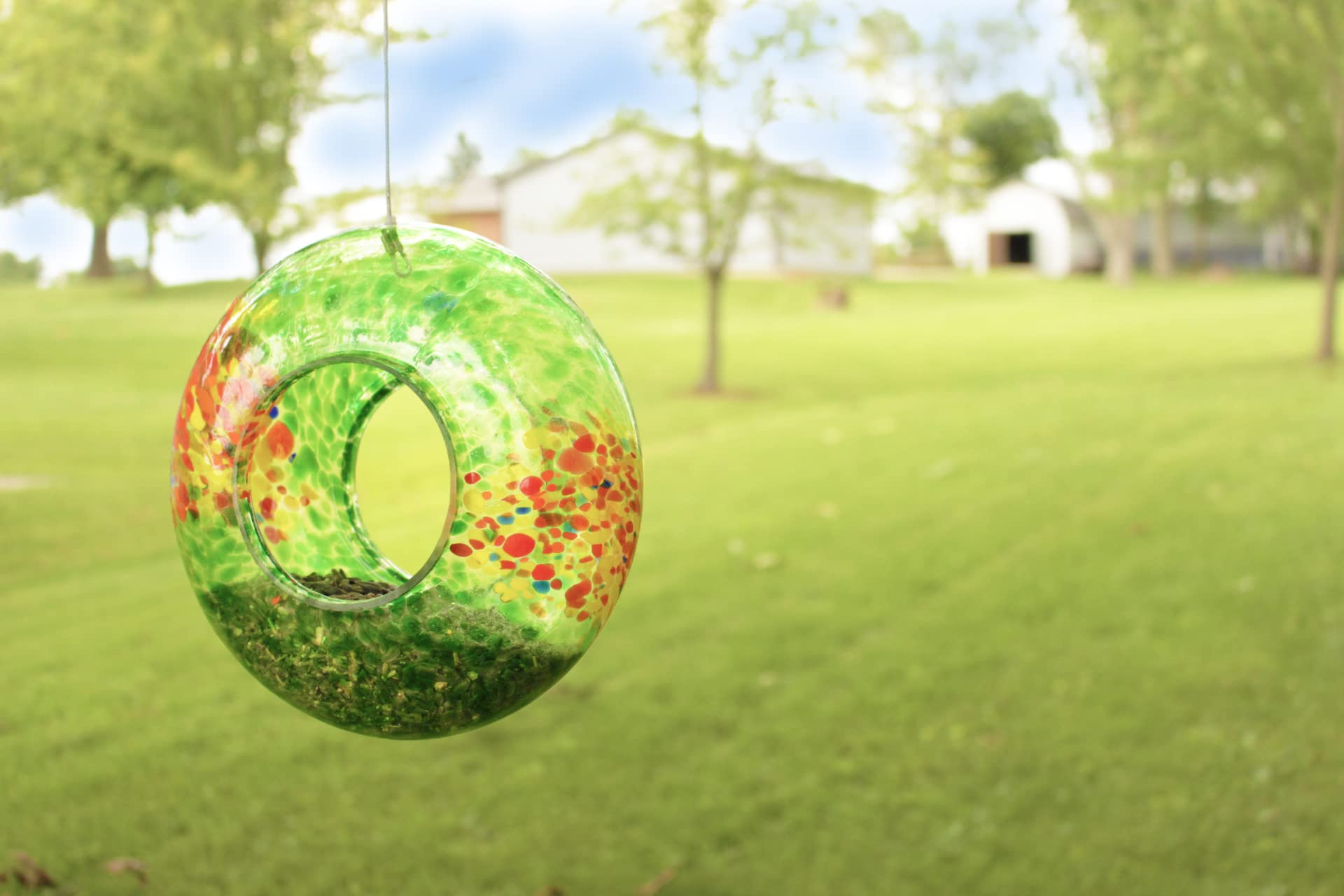 Red Carpet Studios 9-Inch Round Donut-Shaped Glass Bird Feeder with Green, Red & Yellow Spots - Perfect for Garden, Patio & Backyard Bird Watching
