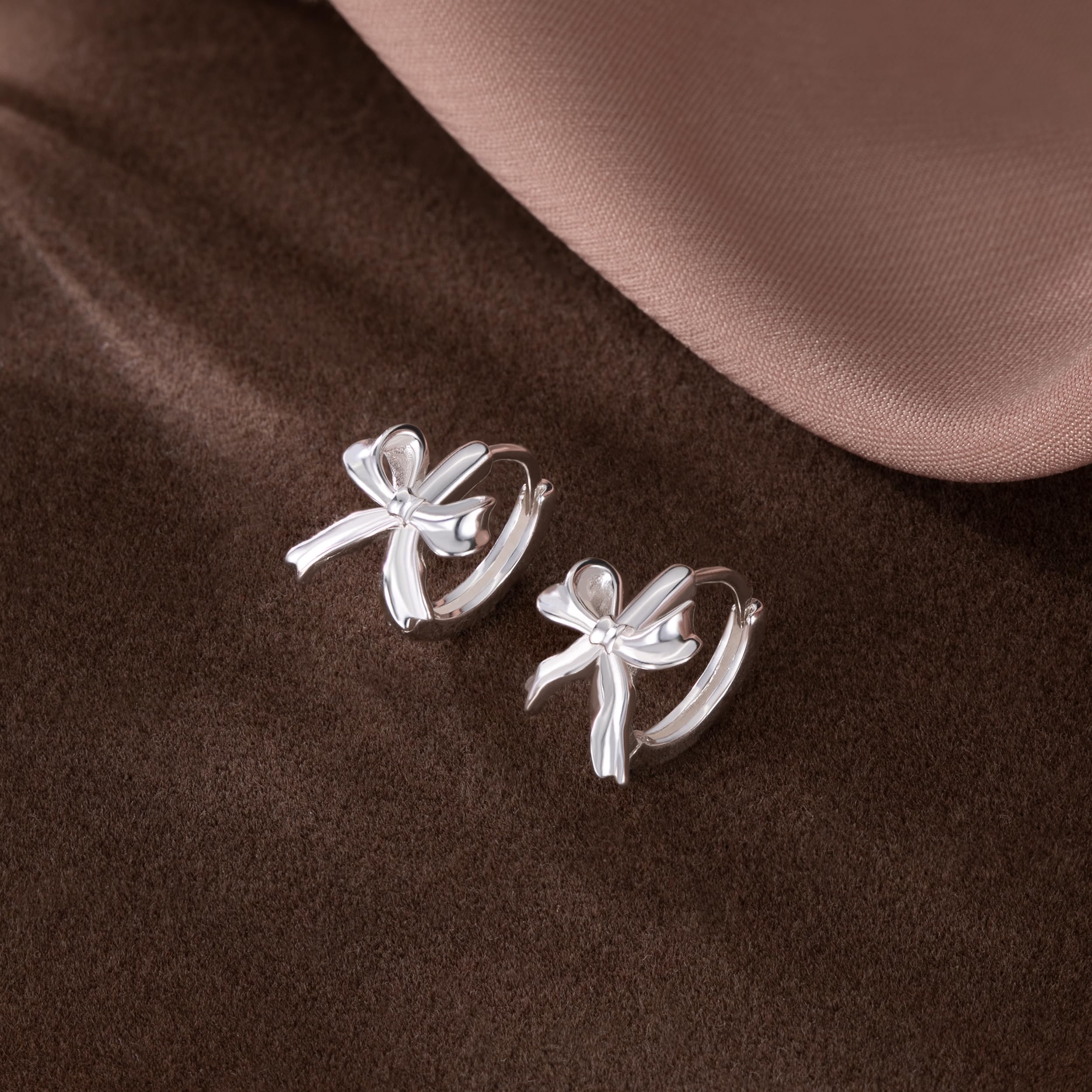 SLUYNZ Sterling Silver Small Bow Hoop Earrings for Women & Teens - Elegant Bow Ribbon Huggie Earrings for Everyday Wear, Parties & Gifts
