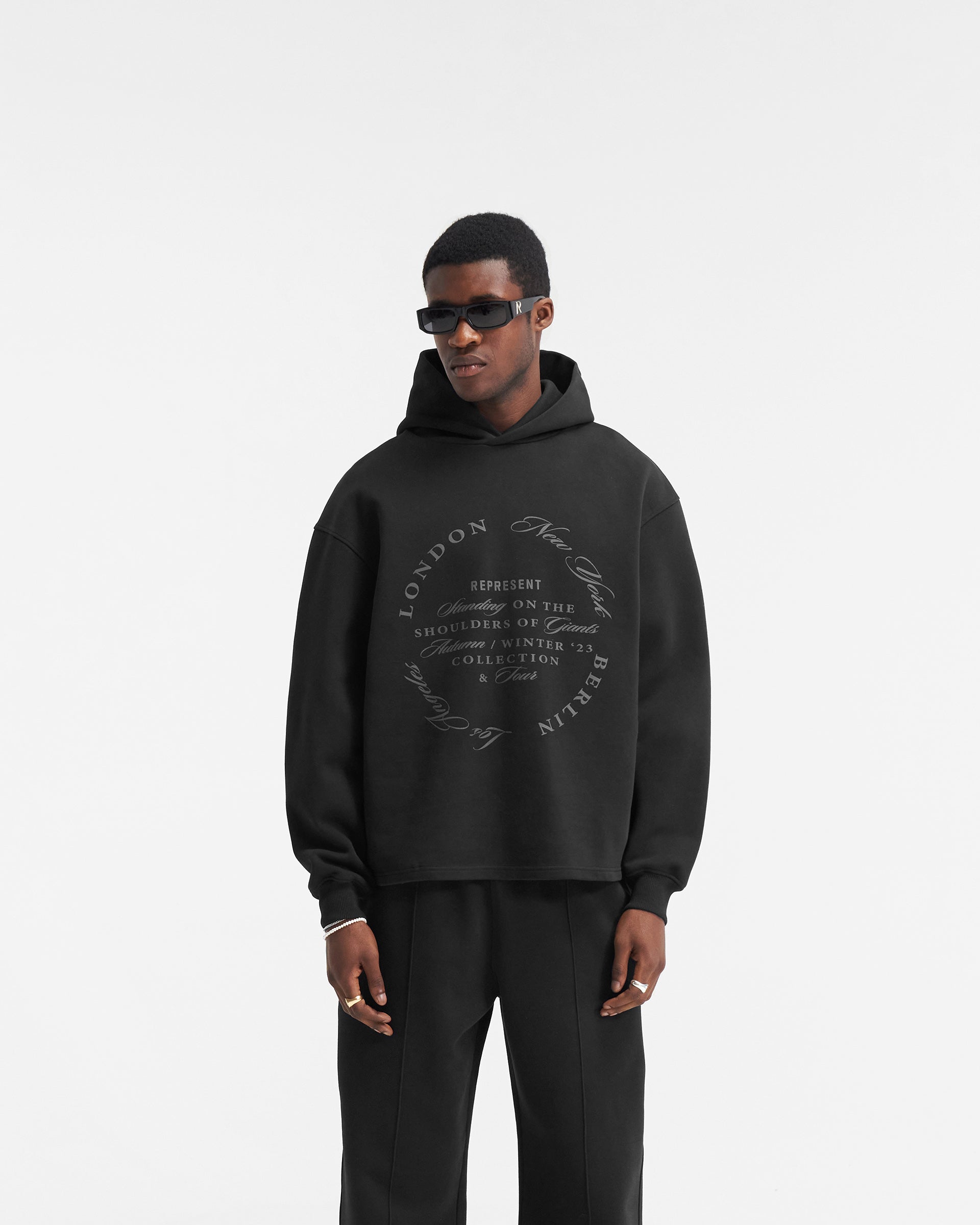 Season Tour Relaxed Hoodie for Men & Women - Soft Cotton Pullover Sweatshirt with Kangaroo Pocket - Black - Perfect for Casual Wear, Travel & Outdoor Activities