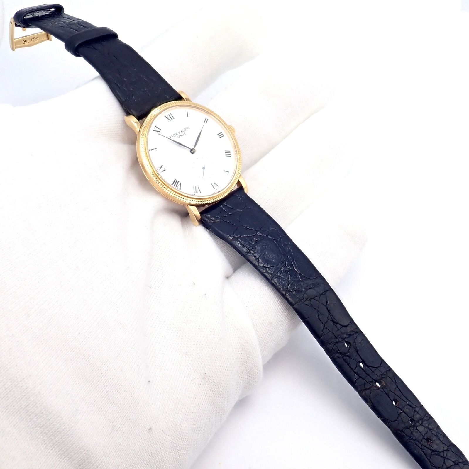 Patek Philippe Calatrava 18k Yellow Gold Men's Watch with Roman Dial - Manual Wind Luxury Dress Watch for Formal Events & Business Occasions
