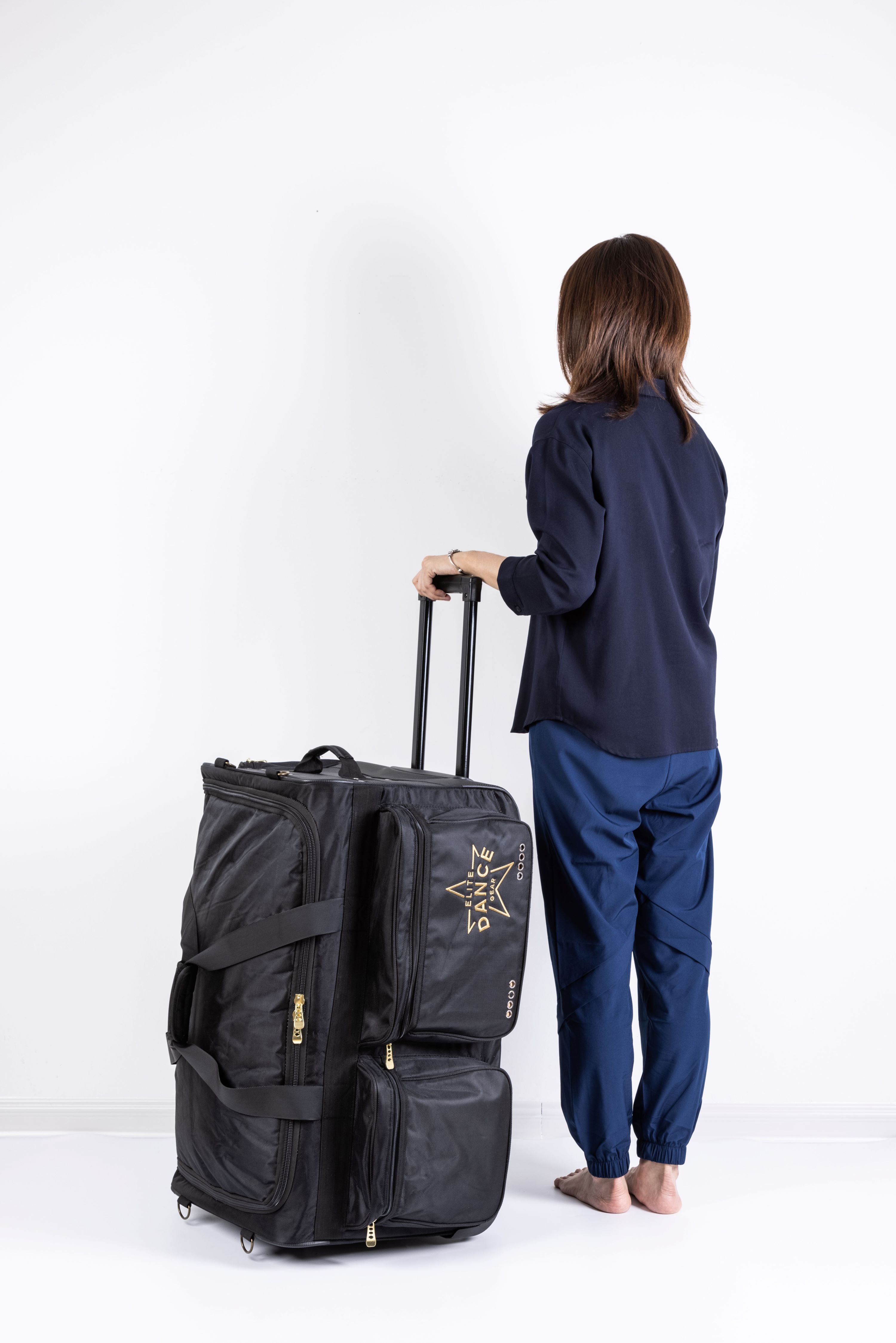 Premium Rolling Duffel Bag with Retractable Garment Rack - Large Travel Luggage for Business Trips, Airplane Carry On & Gym Storage - Heavy Duty Spinner Wheels & Expandable Design