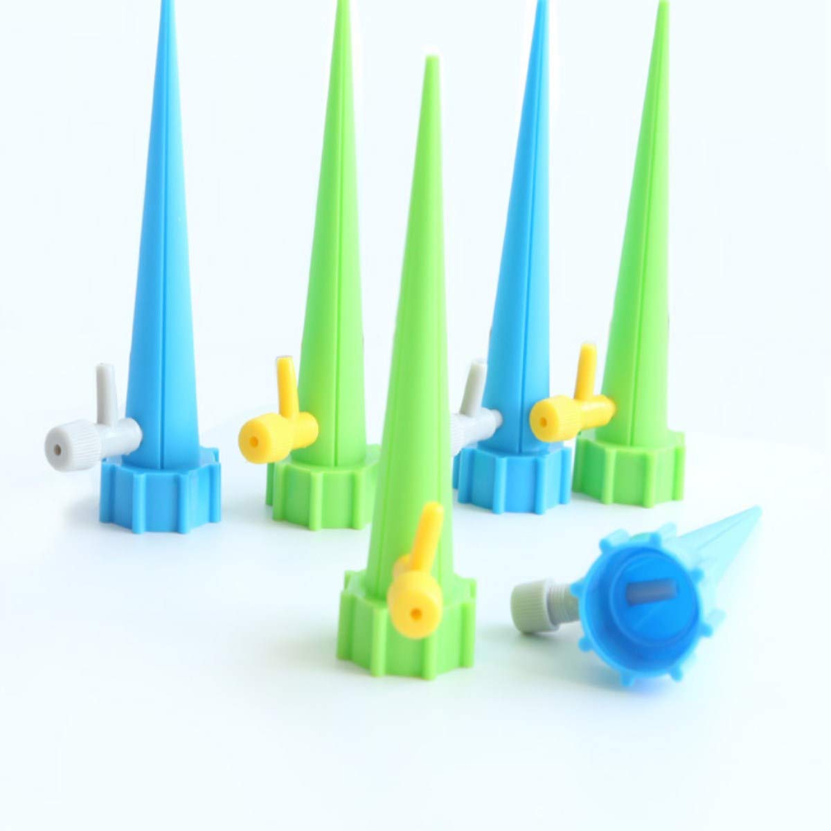 12 Pack Self Watering Spikes - Automatic Drip Irrigation System with Adjustable Flow Control Valve for Indoor/Outdoor Plants, Flowers, Vegetables - Perfect for Vacation Care & Garden Watering