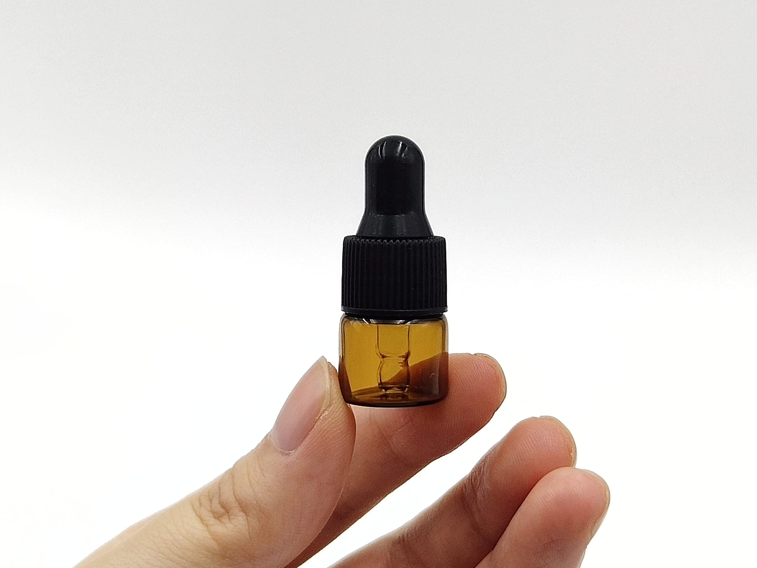15 Pack 1ml Amber Glass Dropper Bottles for Essential Oils & Cosmetics - Travel Sample Vials with Caps for DIY & Beauty Storage