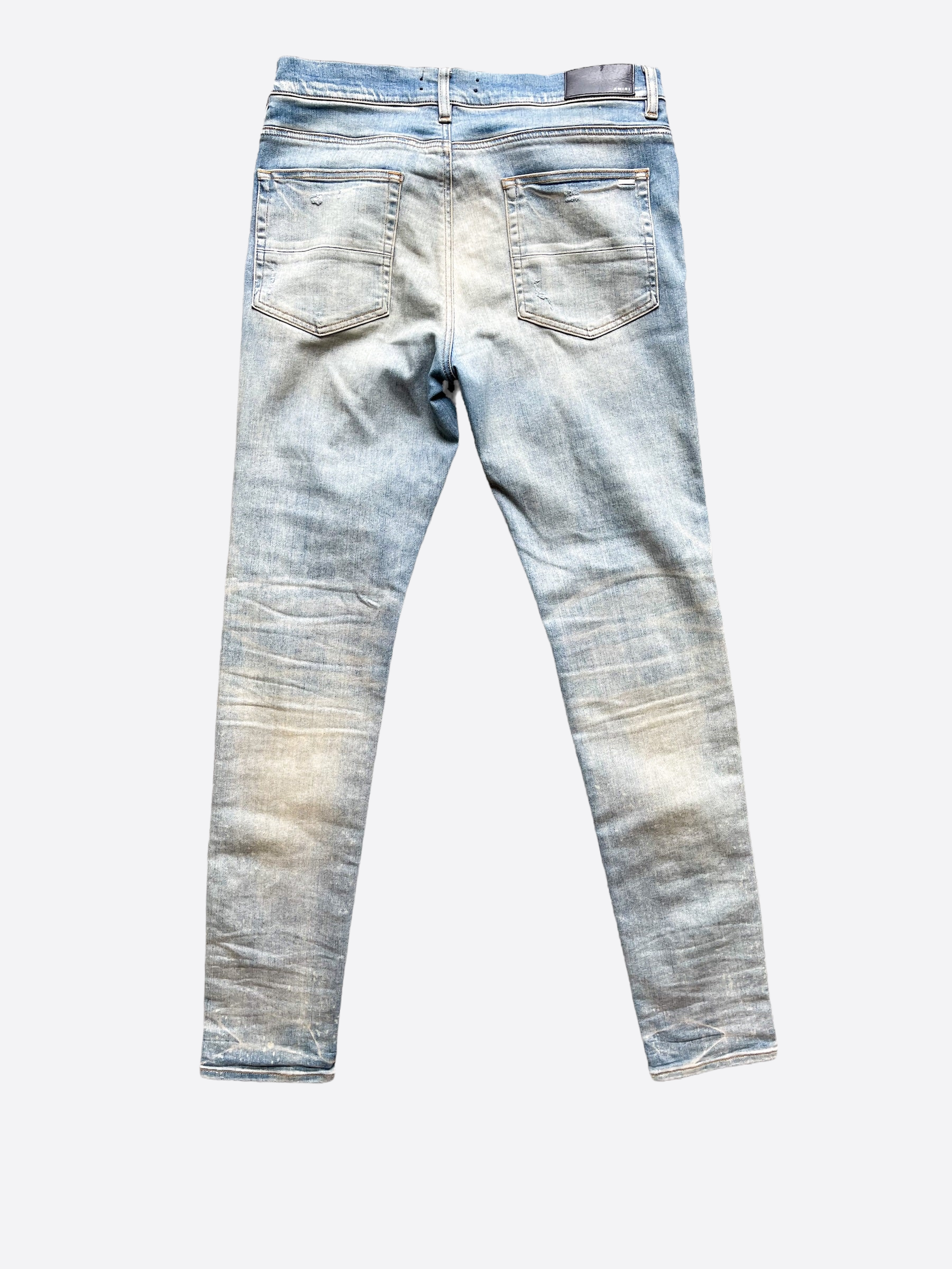 Amiri Military Camo Patch Jeans for Men - Distressed Denim Pants with Camouflage Design | Perfect for Streetwear & Casual Outfits
