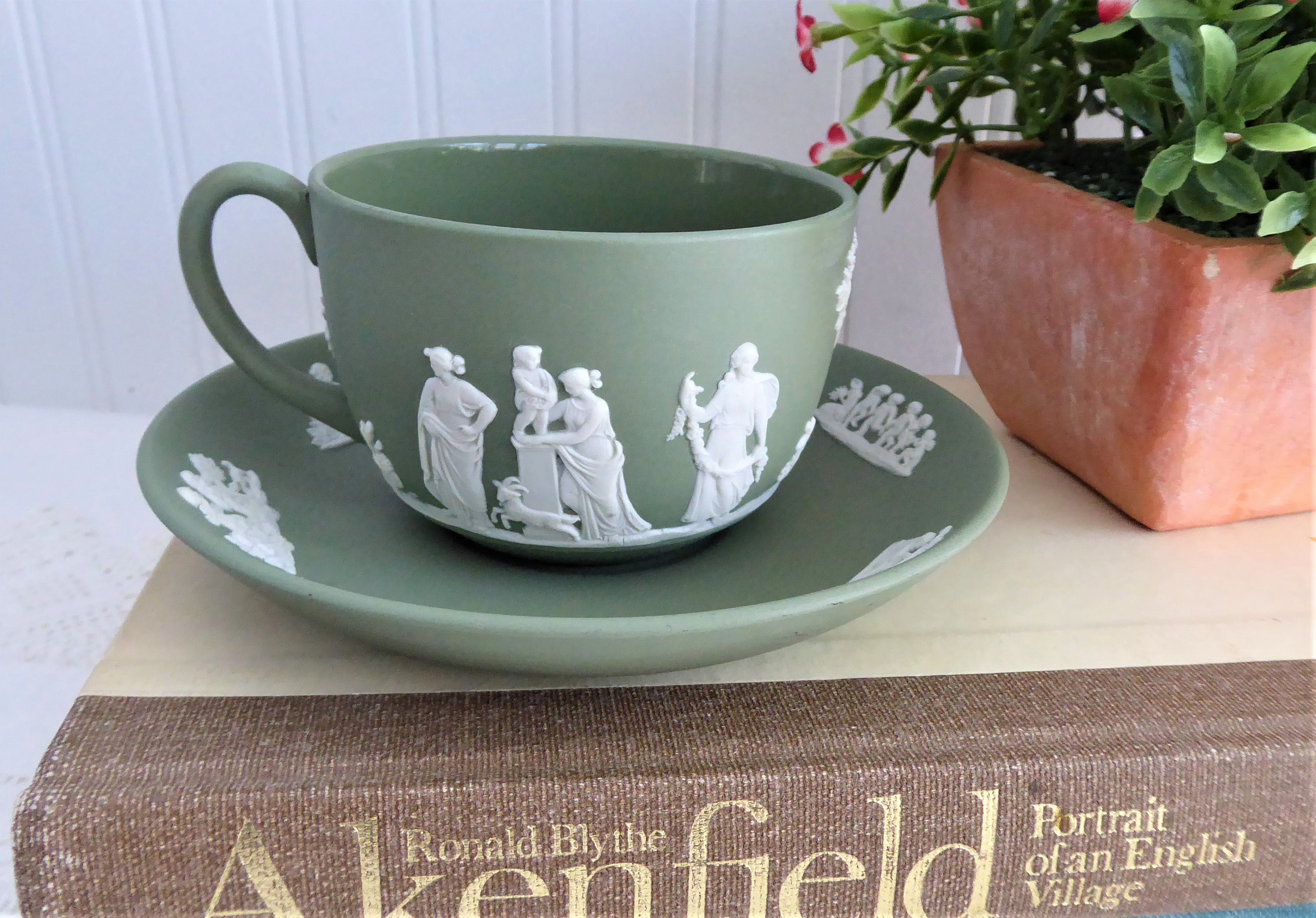Vintage Wedgwood Green Jasperware Cup and Saucer Set with Cherub Sacrifice Figures - Made in England 1970s - Perfect for Tea Time, Collectible Display, and Wedgwood Enthusiasts