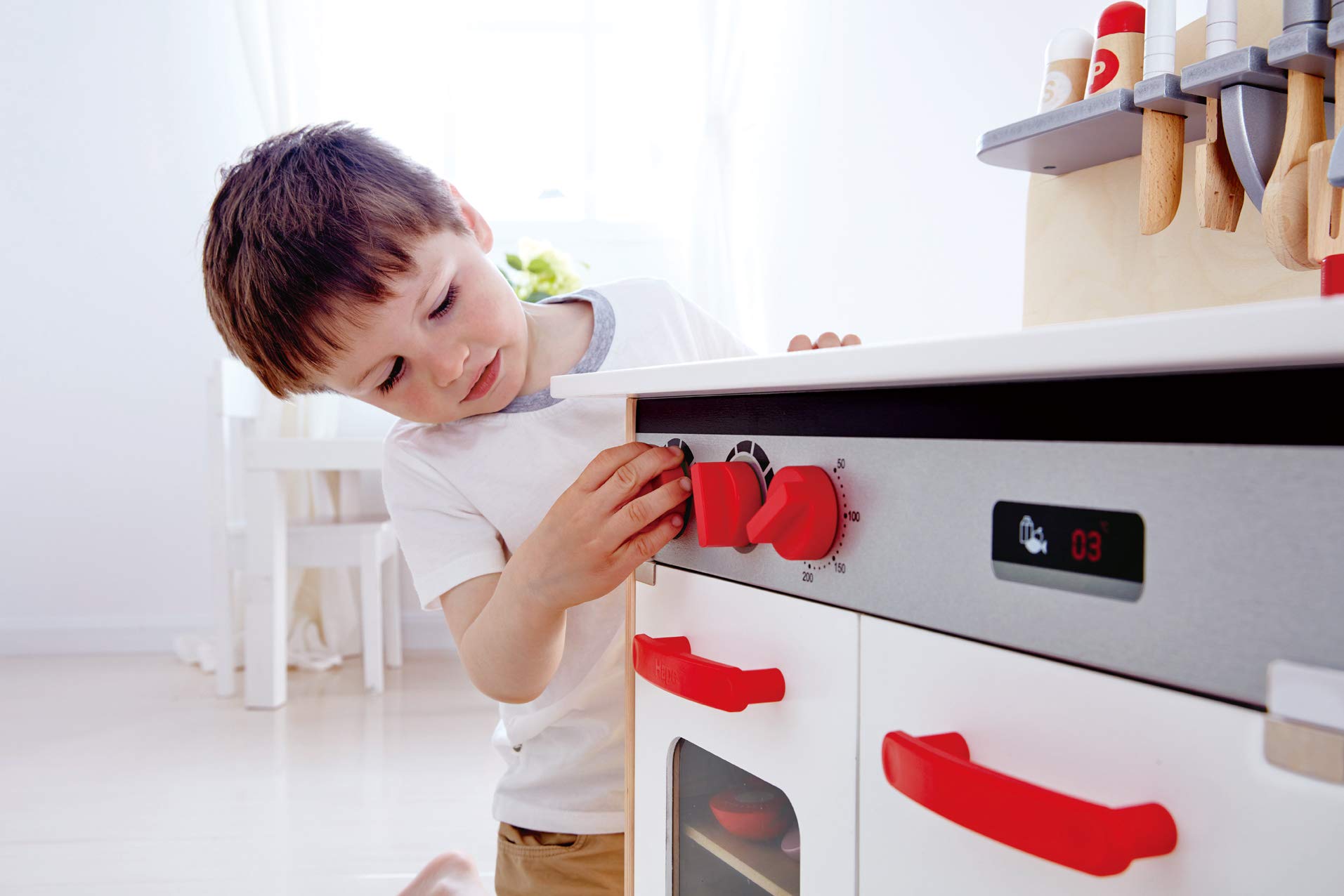 Hape Gourmet Kitchen Toy - Fully Equipped Wooden Pretend Play Kitchen Set with Sink, Stove, Oven, Storage Cabinet & Spice Rack - Perfect for Kids Role Play & Early Learning (Red)