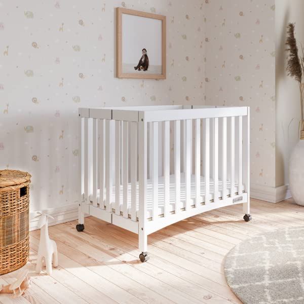 Child Craft London Mini Compact Folding Portable Crib with 2