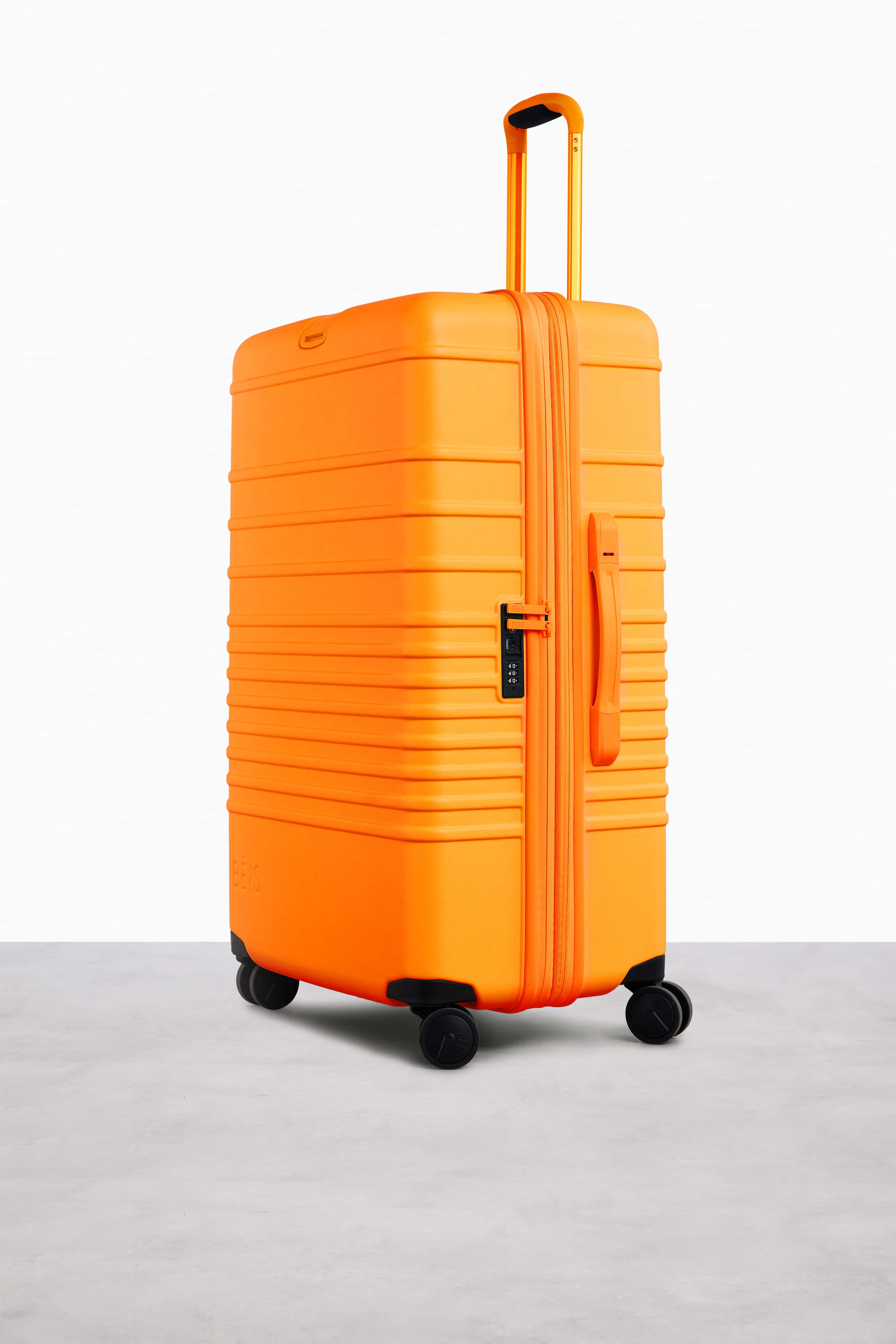 Large Check-In Roller Suitcase in Creamsicle - Spacious & Durable Travel Luggage for Airlines, Vacations & Business Trips