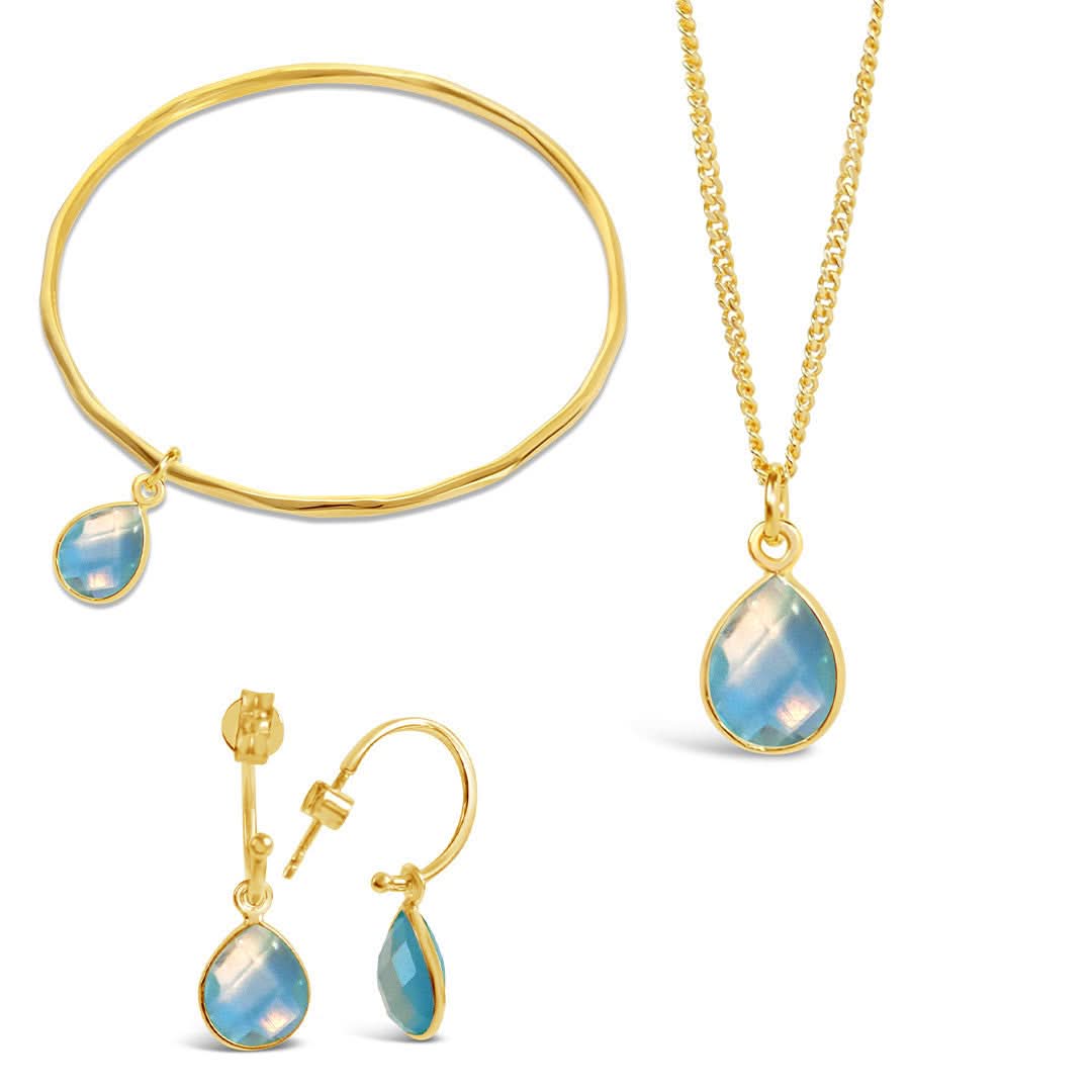 Blue Topaz Charm Bangle in Gold | December Birthstone Jewelry | Perfect Gift for Christmas, Birthday & Anniversary
