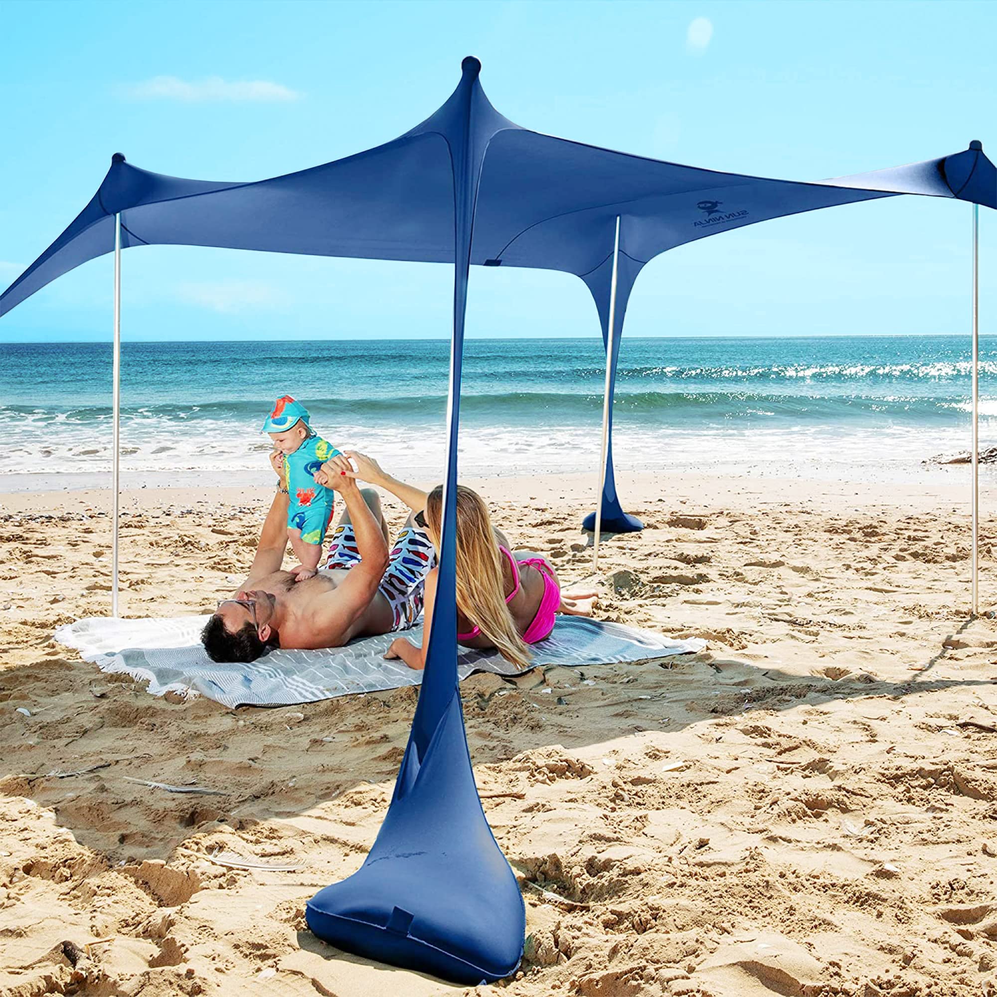 SUN NINJA UPF50+ Beach Tent Sun Shelter with Sand Shovel, Ground Pegs & Stability Poles - Portable Pop Up Shade Canopy for Camping, Fishing, Picnics, Backyard, Beach & Outdoor Family Activities
