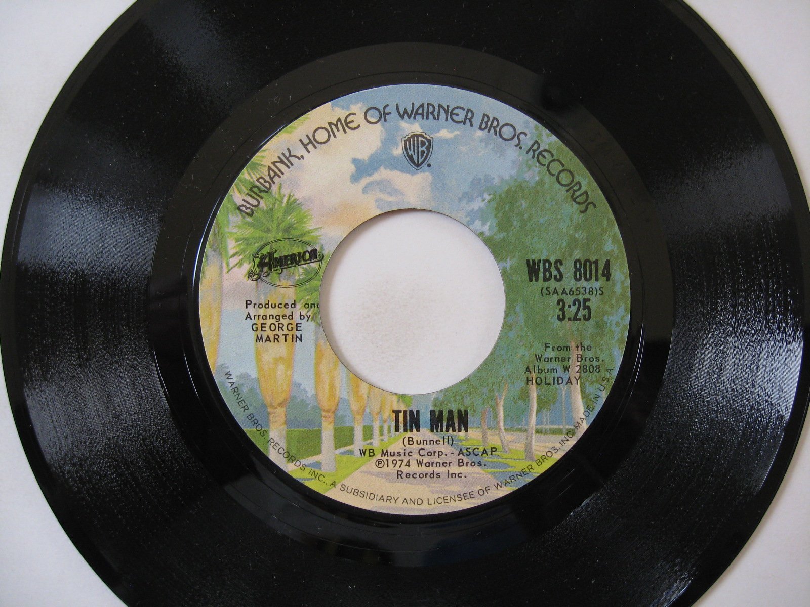 Tin Man / In the Country 45 RPM Vinyl Single Record - Classic Rock Collectible for Music Enthusiasts & DJs