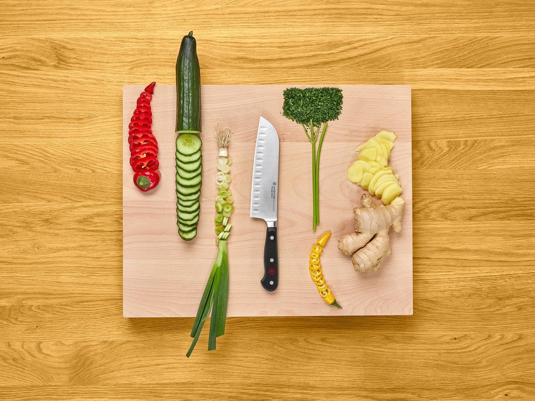 Wusthof Classic 7-Inch Hollow Edge Santoku Knife - Premium German Steel for Precision Slicing, Dicing & Chopping - Ideal for Home Chefs & Professional Kitchens