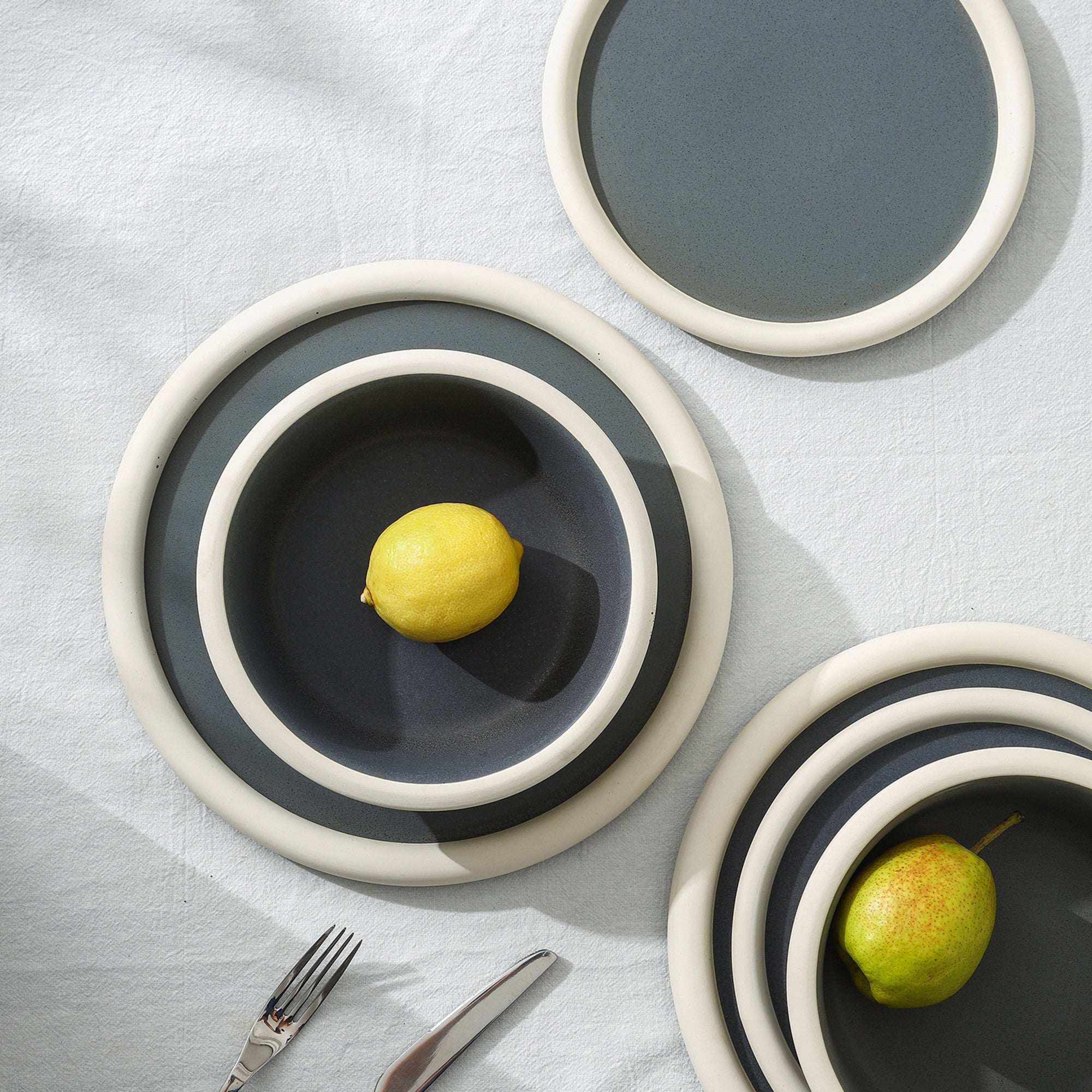 Premium Capri Stoneware Dinnerware Set - 16-Piece Grey Dinner Plates, Bowls & Mugs - Durable Porcelain Tableware for Everyday Use & Entertaining