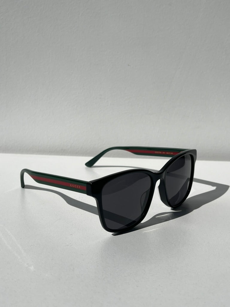 Gucci GG0417SK Black Striped Leg Sunglasses for Women - Classic Designer Shades with UV Protection - Perfect for Beach, Driving & Fashion Outfits