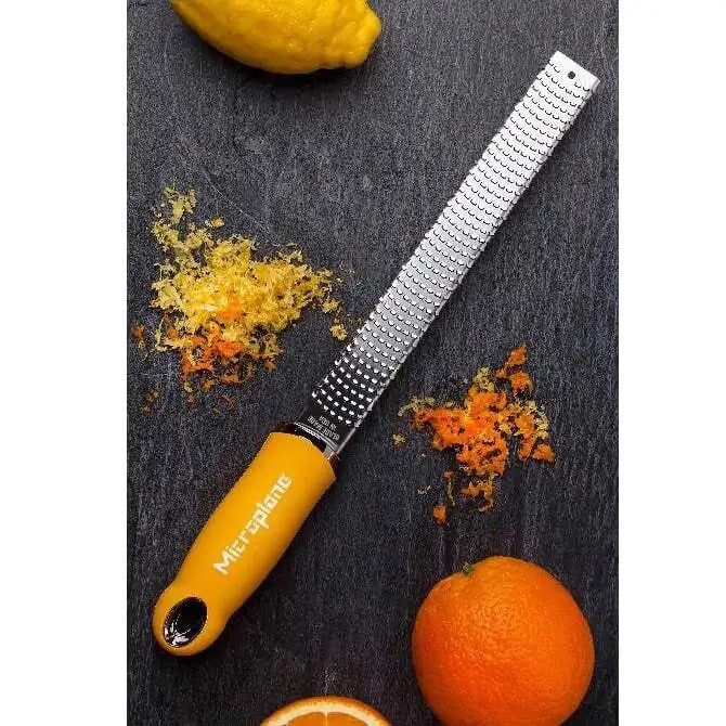 Microplane Premium Series Zester Grater - Ultra Sharp Stainless Steel Kitchen Tool for Zesting Citrus, Grating Cheese & Chocolate - Perfect for Baking, Cooking & Garnishing Dishes
