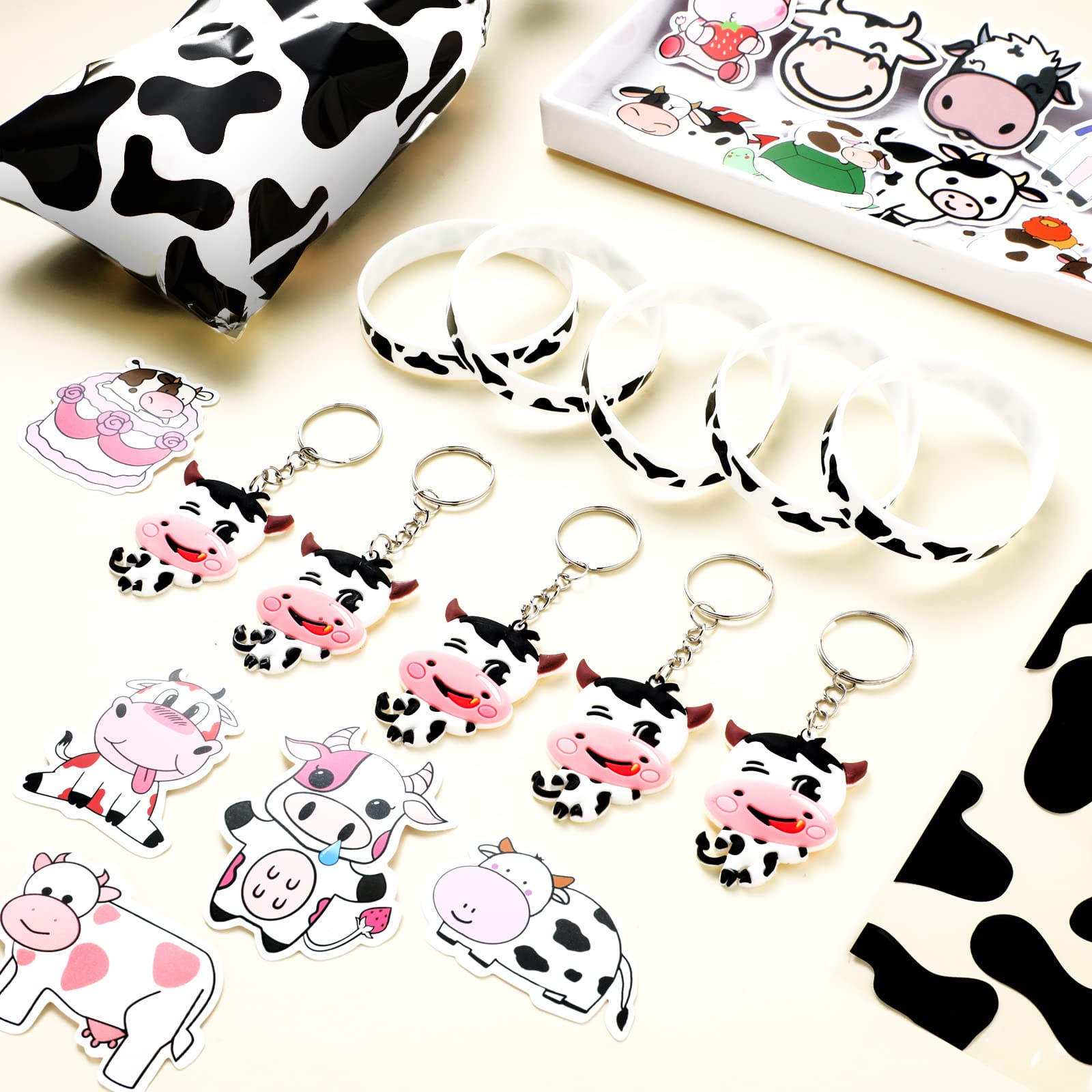Chunful 148 Pcs Cow-Themed Party Favors Kit - Includes Cute Cow Keychains, Printed Gift Bags, Silicone Bracelets & Animal Stickers for Girls Birthday Party, Baby Shower & Cowboy Theme Events (White)