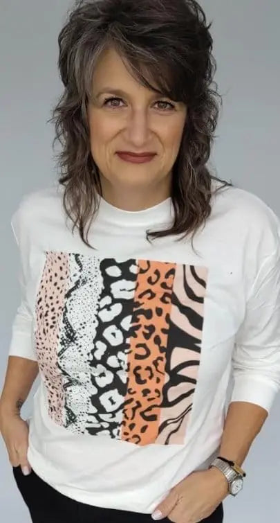 Stylish Cream Multi-Animal Print Sweatshirt for Women - Cozy Pullover with Leopard, Zebra & Cheetah Patterns - Perfect for Casual Outfits, Streetwear & Lounge Wear