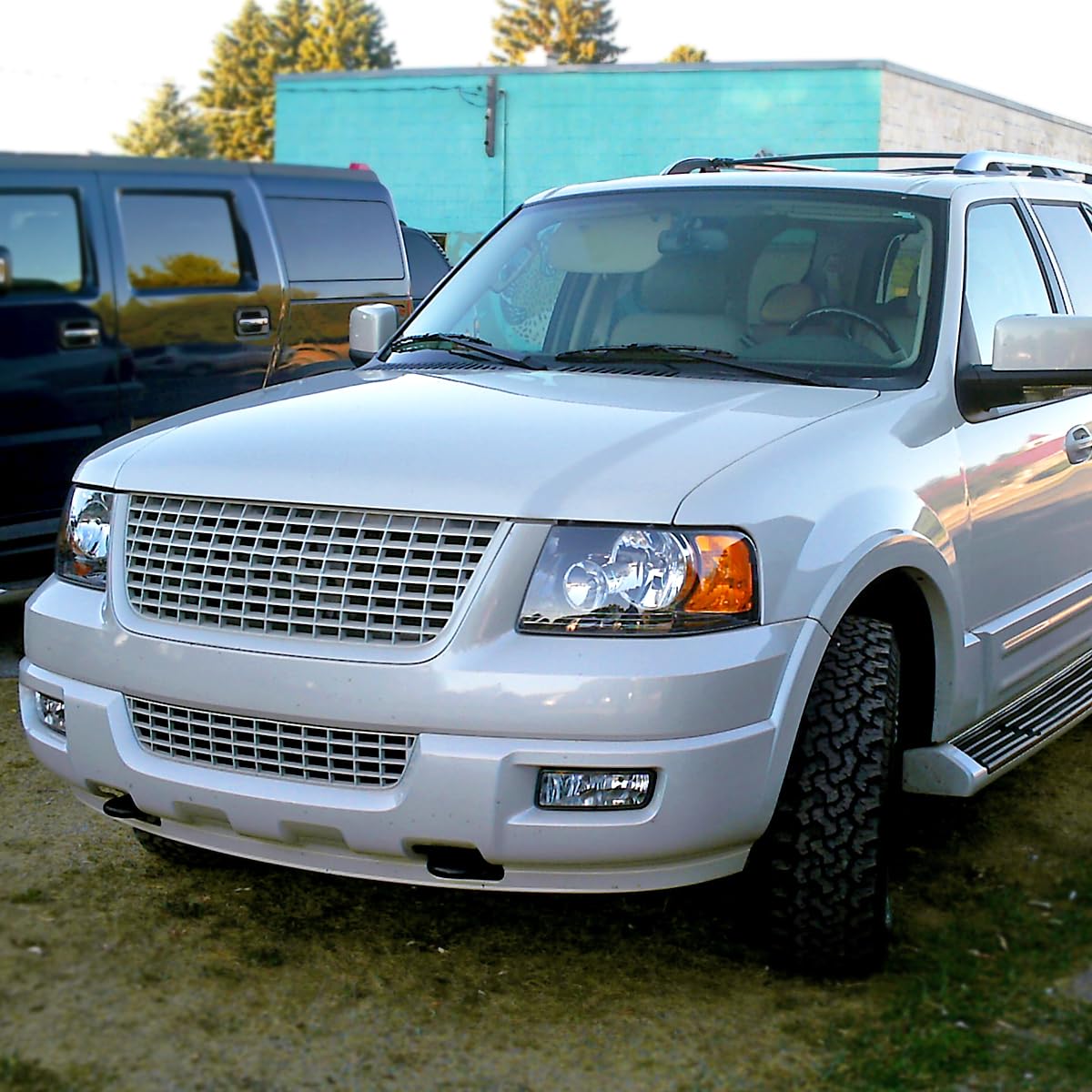 03-06 Ford Expedition Black Headlights & Headlamps Pair - Left & Right Replacement for Improved Night Driving & Style Upgrade