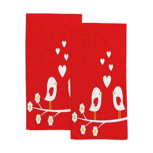 Two Cute Birds on Blooming Branch