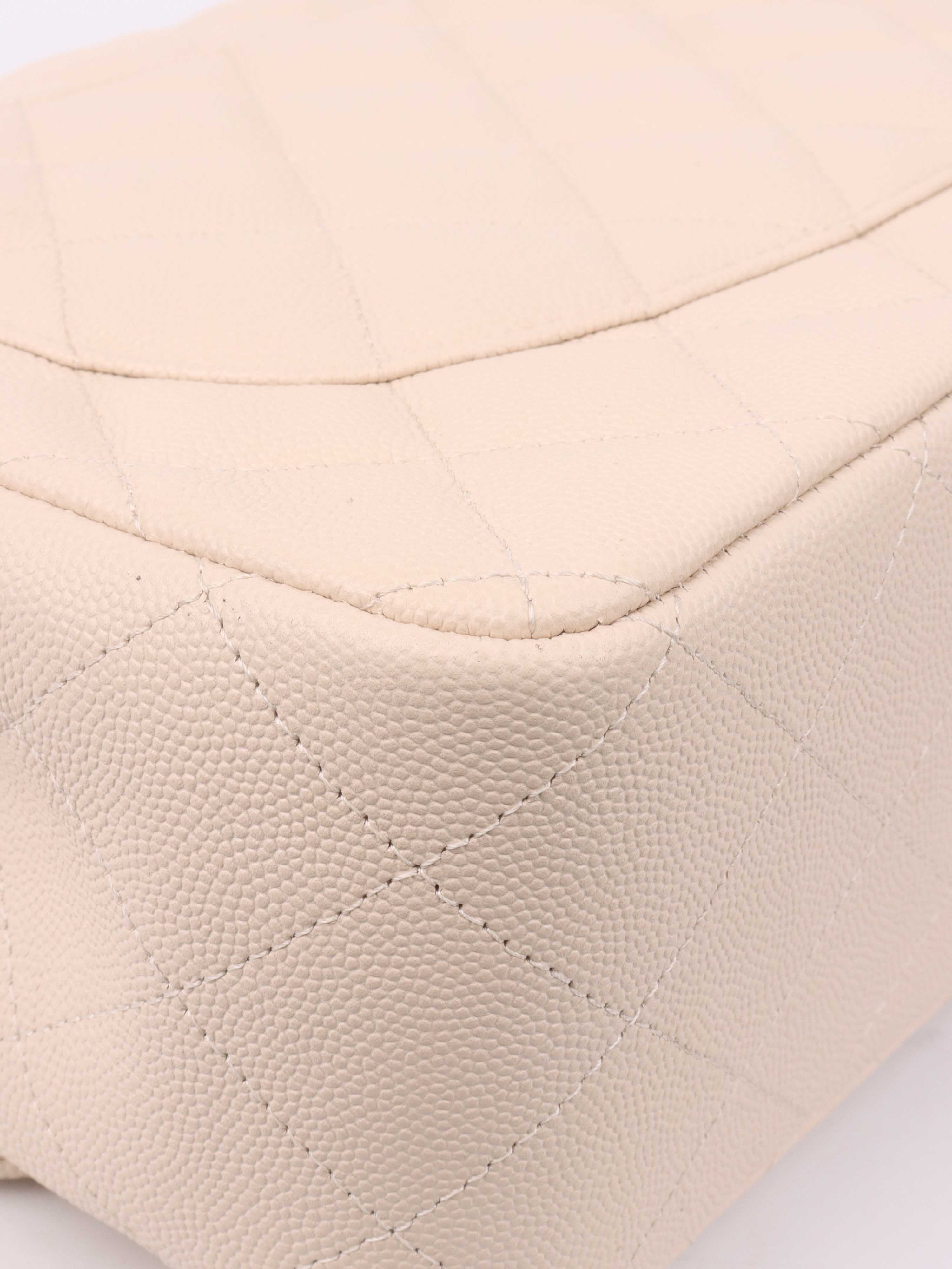 Chanel Jumbo Ivory Caviar Classic Flap Bag - Luxury Designer Handbag for Women | Perfect for Parties, Weddings & Special Occasions