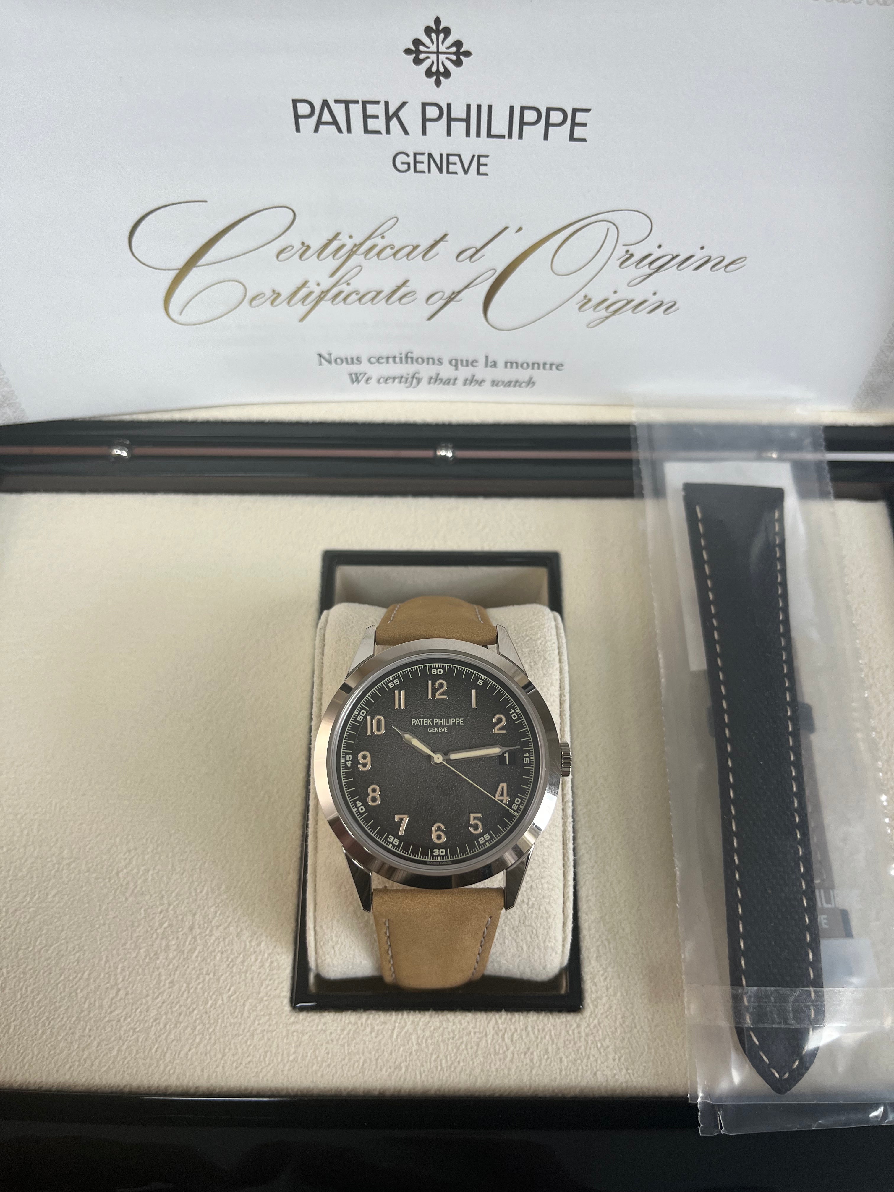Patek Philippe Calatrava 5226G-001 40mm Men's Luxury Watch - 18K White Gold Case with Textured Dial - Perfect for Business Meetings & Formal Occasions