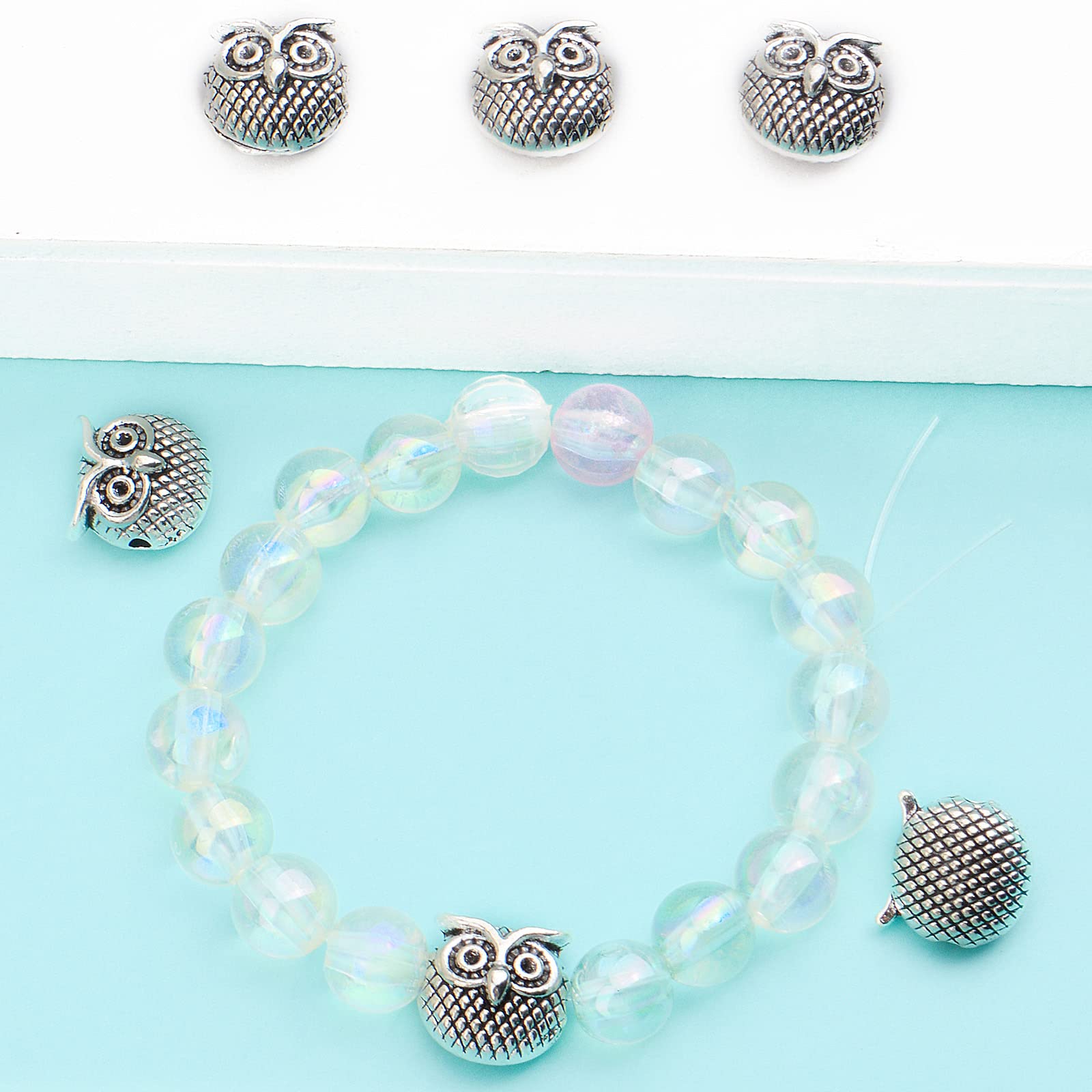 BronaGrand 30pcs Antique Silver Owl Spacer Beads - Tibetan Alloy Animal Owl Head Charms for DIY Jewelry Making, Bracelets & Necklaces - Perfect for Boho, Hippie & Handmade Craft Projects
