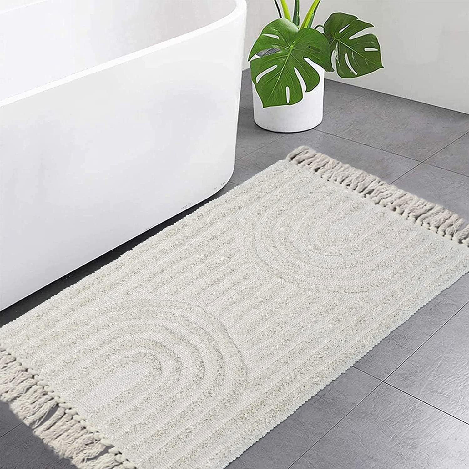 LEEVAN Boho Bathroom Rugs 2x3 Feet - Handmade Washable Beige Bath Mat with Tassels, Bohemian Style Cotton Kitchen Runner, Farmhouse Entryway Rug for Bedroom, Laundry Room & Bathroom Decor - Soft Non-Slip Woven Throw Rug for Cozy Home Accent