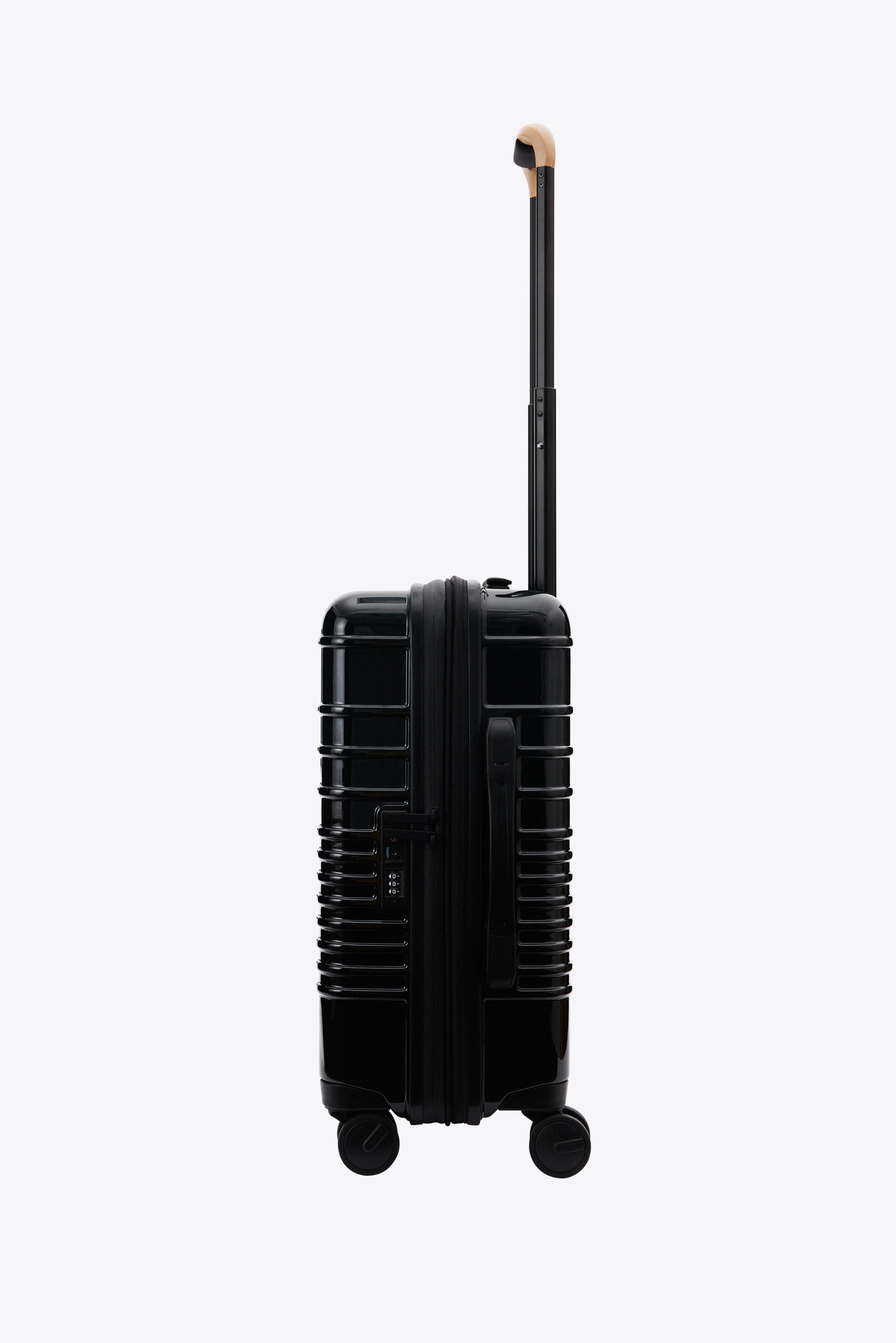Glossy Black Carry On Roller Luggage - Perfect for Air Travel & Weekend Getaways