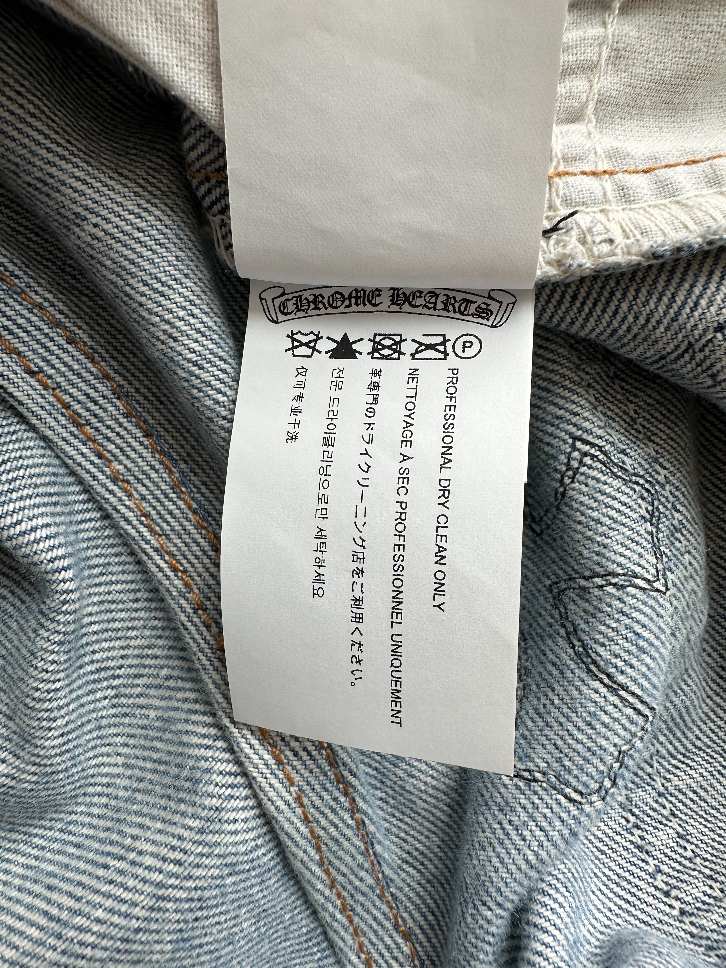 Chrome Hearts x Levi's Light Blue Distressed Jeans with Black Leather Cross Patch - Stylish Vintage Denim for Men's Streetwear & Casual Outfits