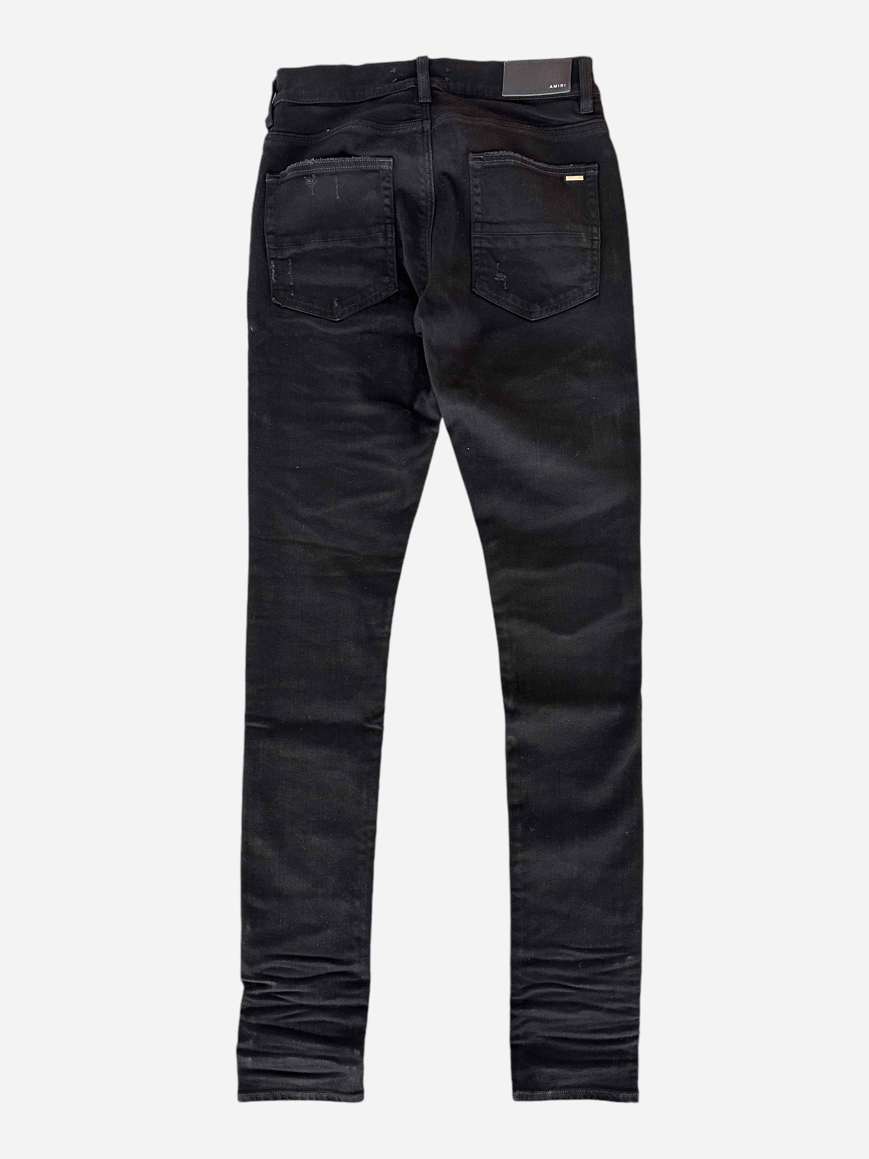 Amiri Black Leather Patch Thrasher Jeans for Men - Premium Distressed Denim Pants with Signature Leather Detail | Perfect for Streetwear, Casual Outfits & Night Out Looks