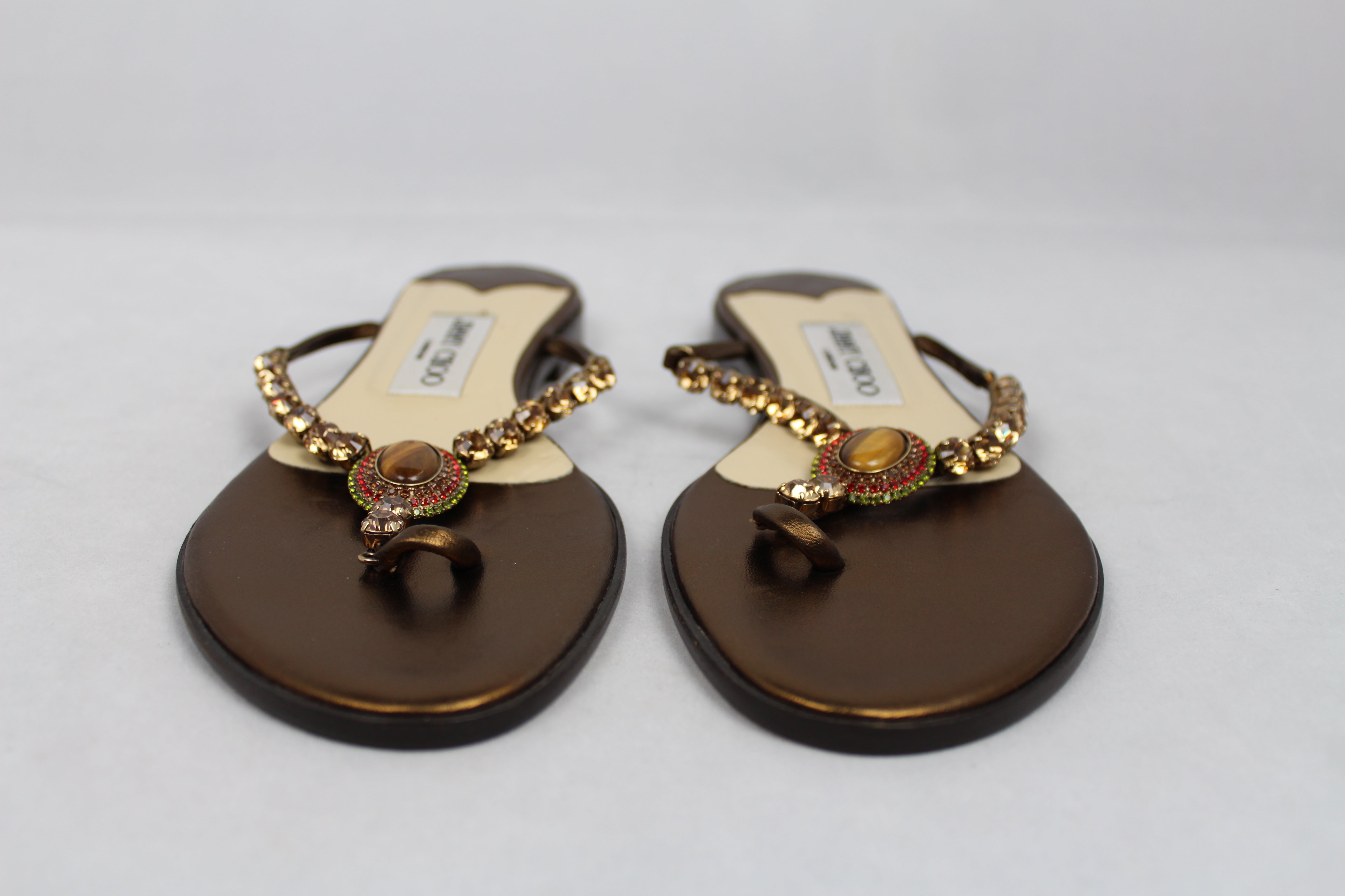 Jimmy Choo Bronze Flip Flops with Stones and Rhinestones - Size 37 | Elegant Summer Sandals for Beach, Pool, and Casual Outings