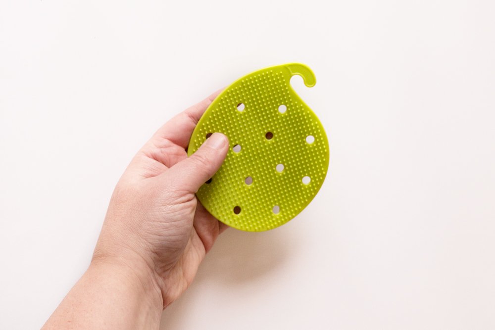 Double Sided Vegetable Scrubber Brush - Multi-Purpose Fruit & Potato Cleaner, Carrot Scrubber, Jar Opener & Trivet by Cestari Kitchen - Perfect for Organic Produce, Meal Prep & Kitchen Organization